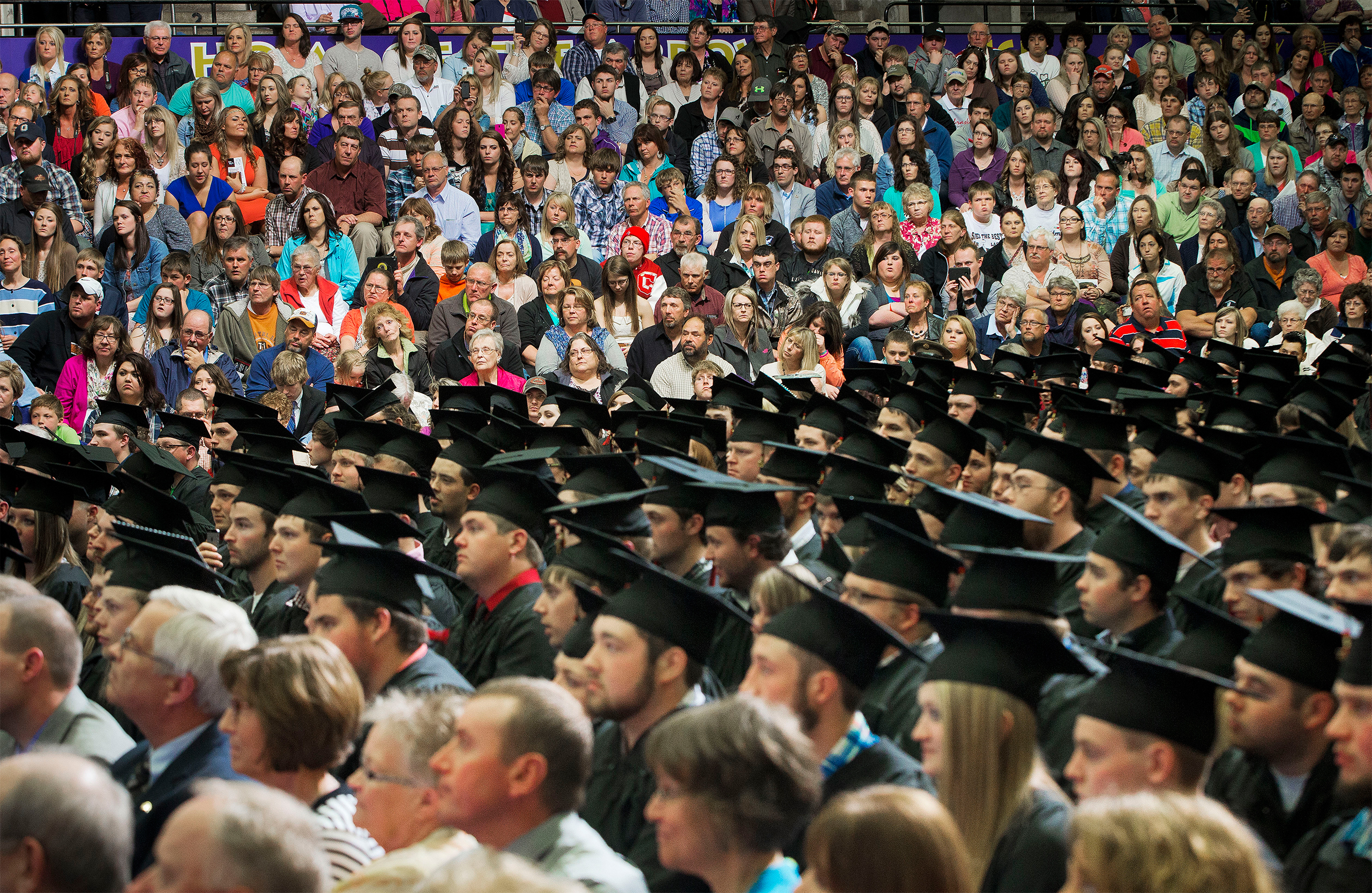 Graduates, faculty and guest in the audience listen to President Barack Obama deliver the commencement address at Lake Area Technical Institute, Friday, May 8, 2015 in Watertown, SD. 