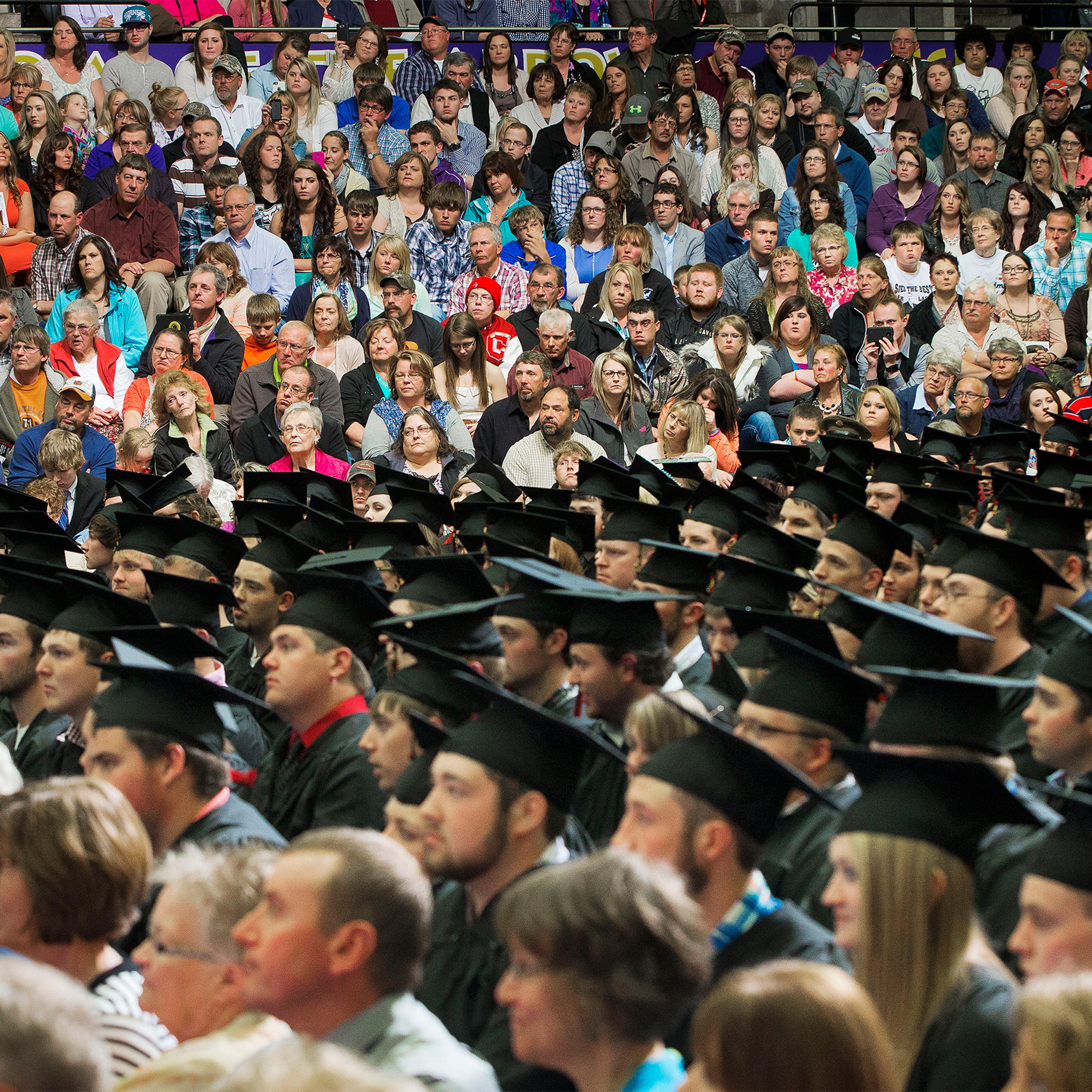 Graduates, faculty and guest in the audience listen to President Barack Obama deliver the commencement address at Lake Area Technical Institute, Friday, May 8, 2015 in Watertown, SD.