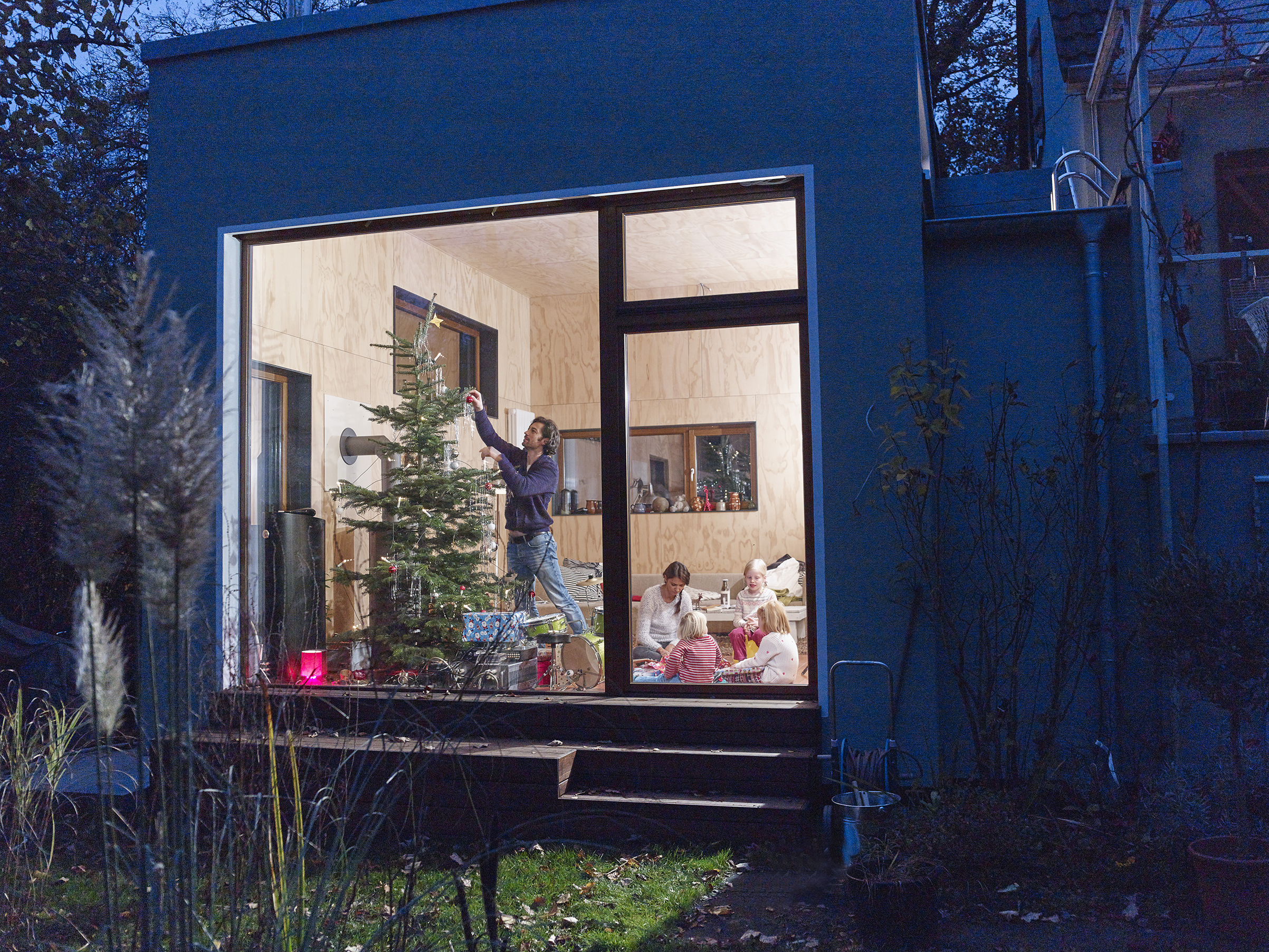 Family celebrating Christmas at home