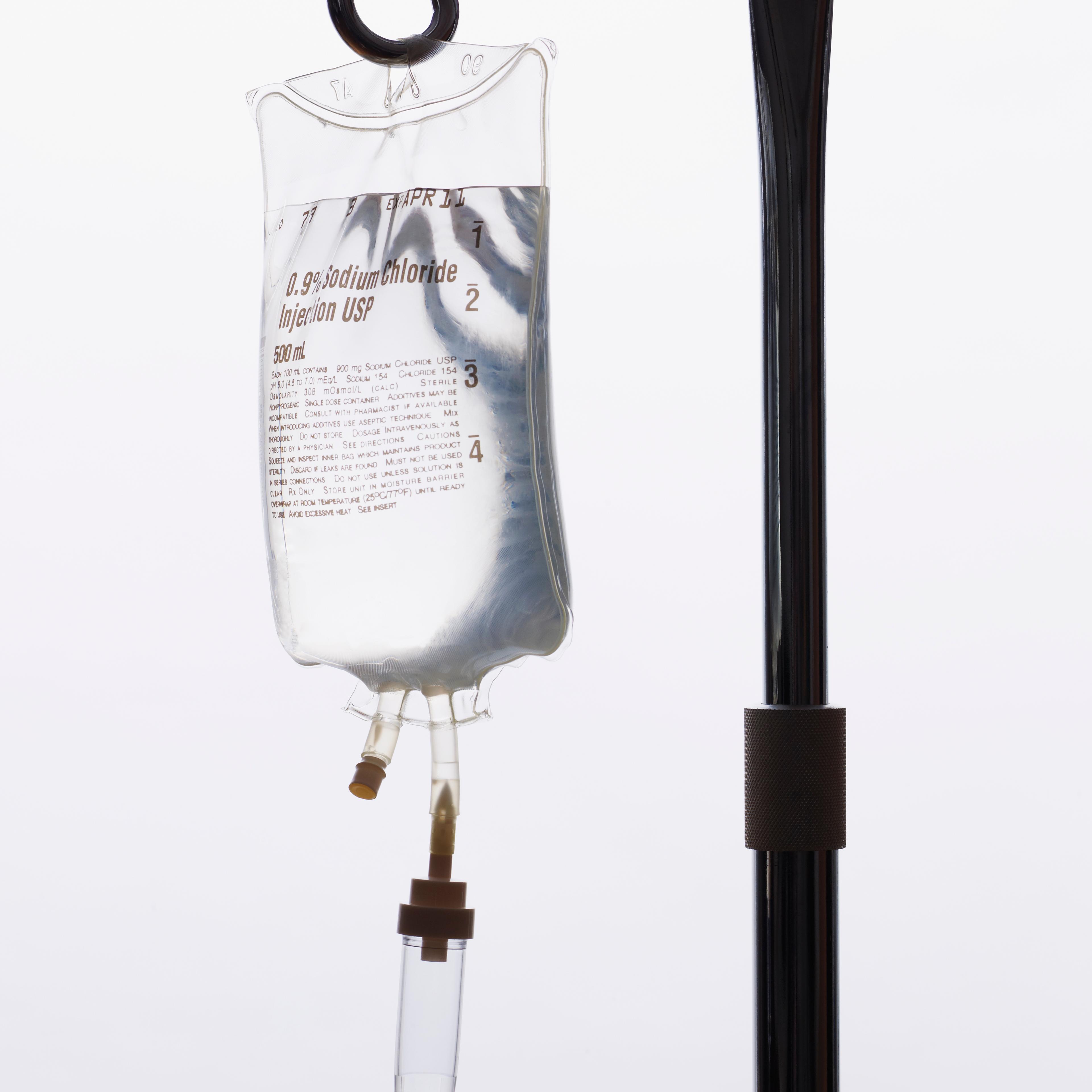 Intravenous Saline Drip on IV Pole.