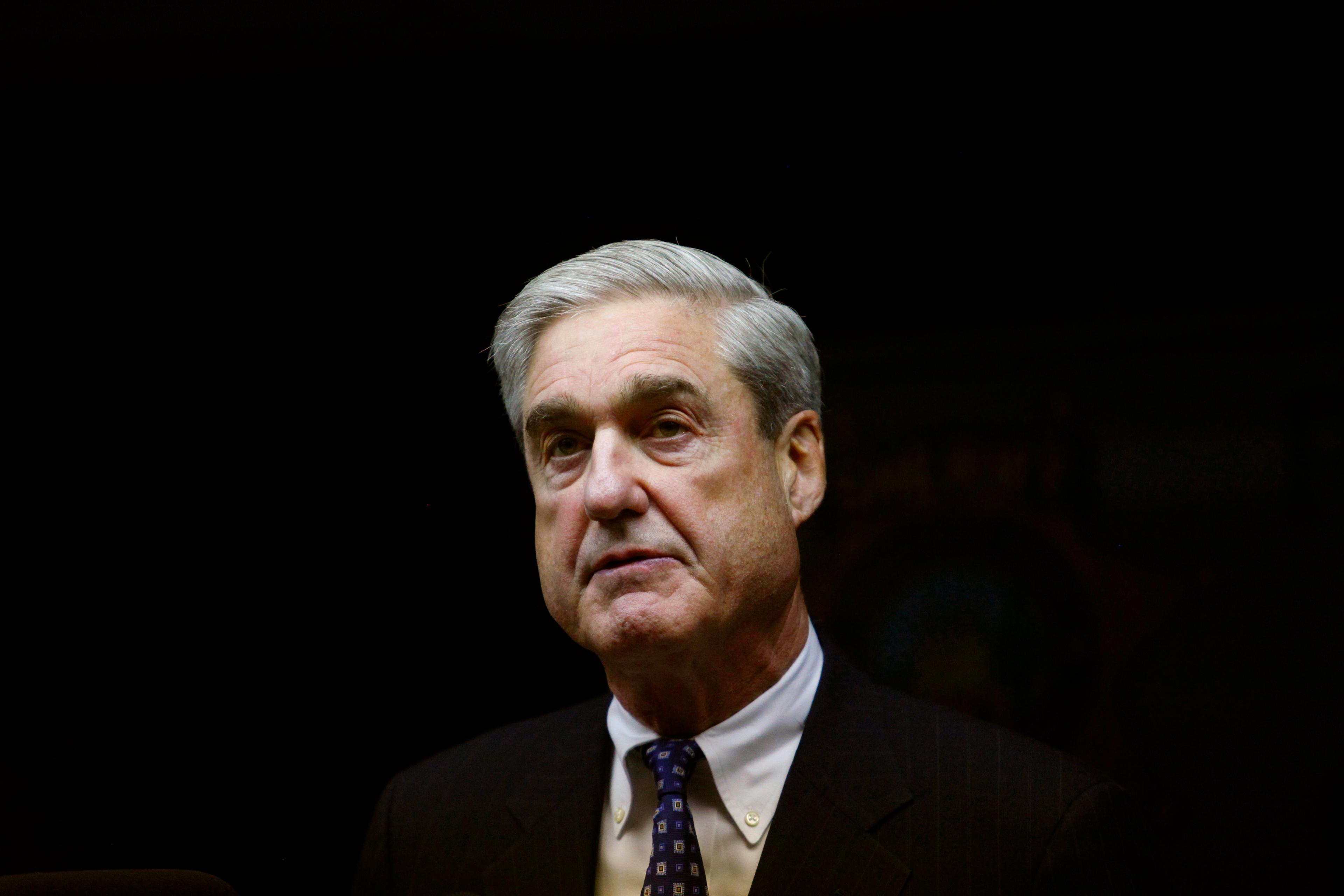 FBI Director Robert S. Mueller III speaks at the Pima County Sheriff's Office in response to Saturday's shooting of U.S Representative Gabrielle Giffords (D-AZ) among others at a Safeway in Tucson, Arizona