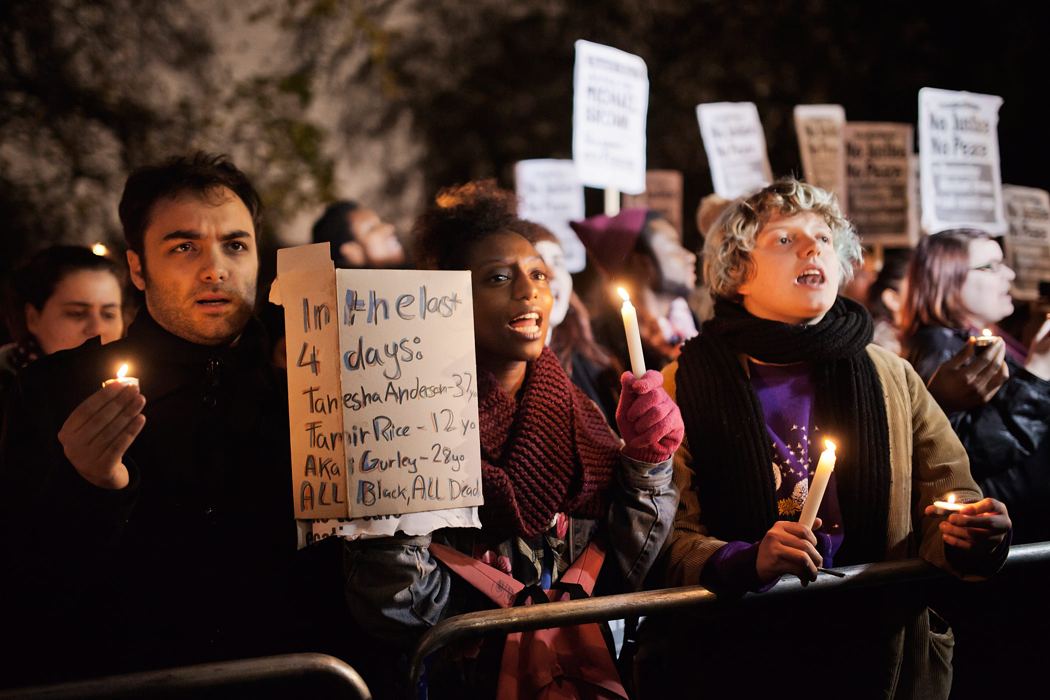 People gather outside the US embassy in Central London,
