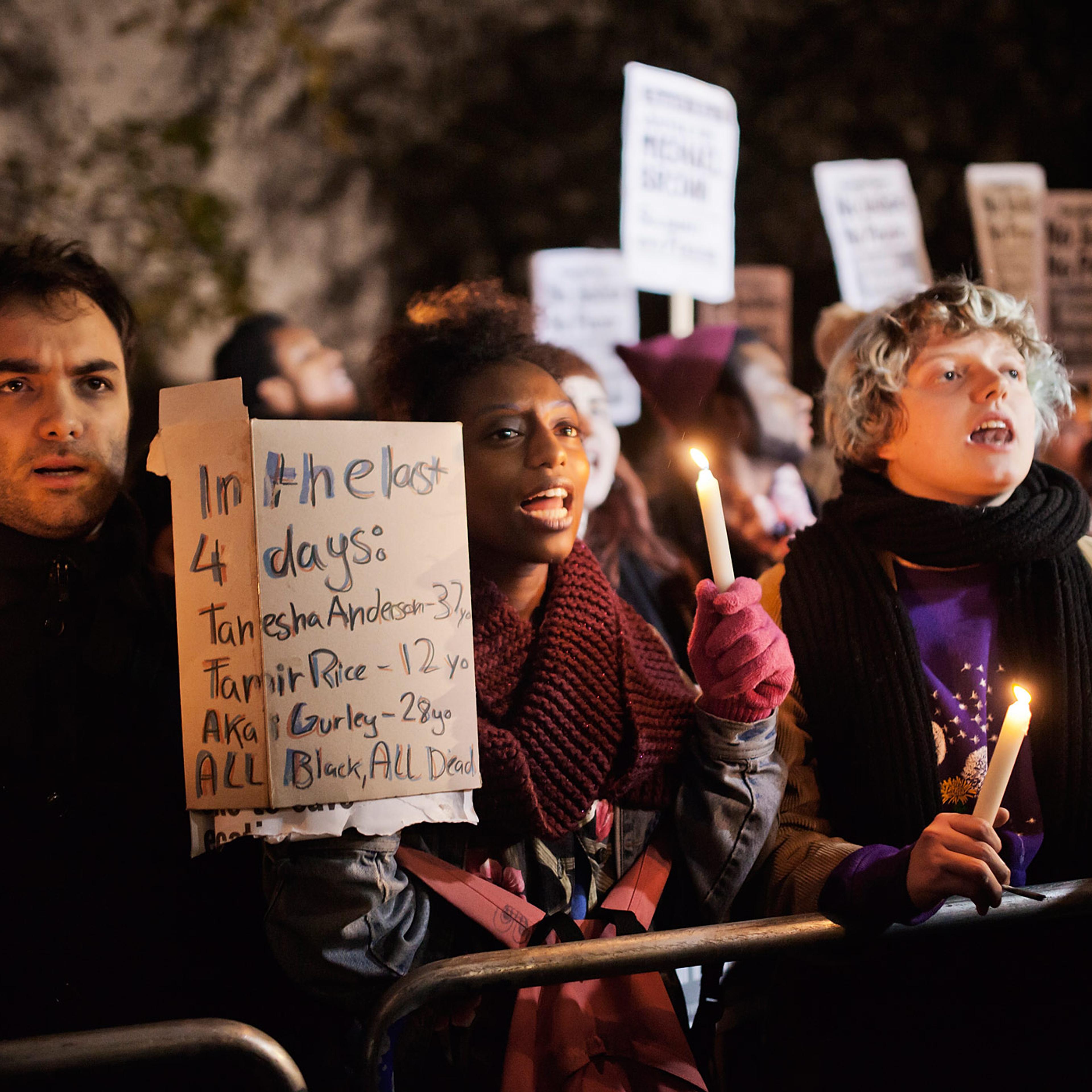 People gather outside the US embassy in Central London,