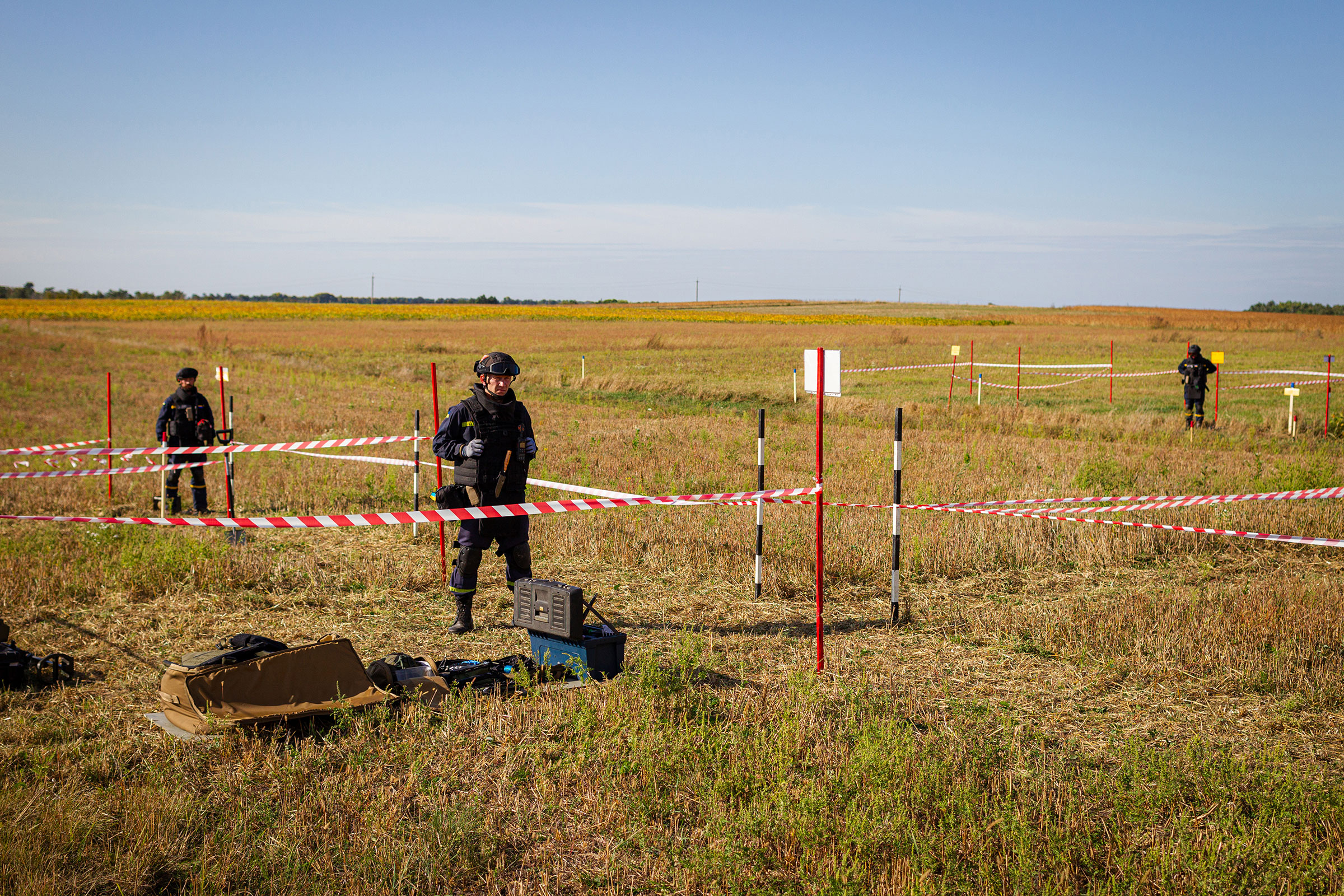 Sappers are seen at work during a press tour to demonstrate the integration of AI into the process of humanitarian demining, in the Zhytomyr Region, northern Ukraine on Sept. 20, 2023.