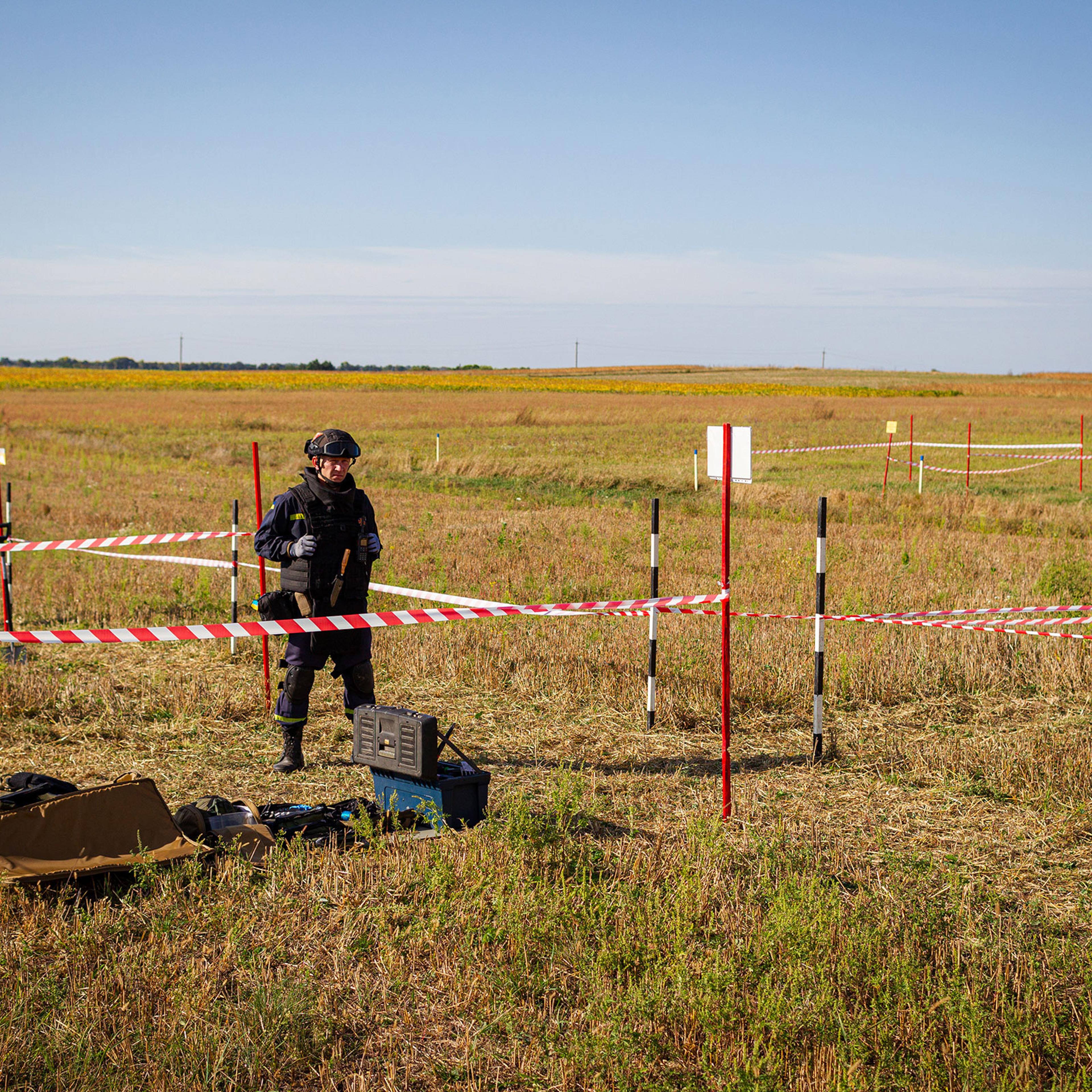 Sappers are seen at work during a press tour to demonstrate the integration of AI into the process of humanitarian demining, in the Zhytomyr Region, northern Ukraine on Sept. 20, 2023.