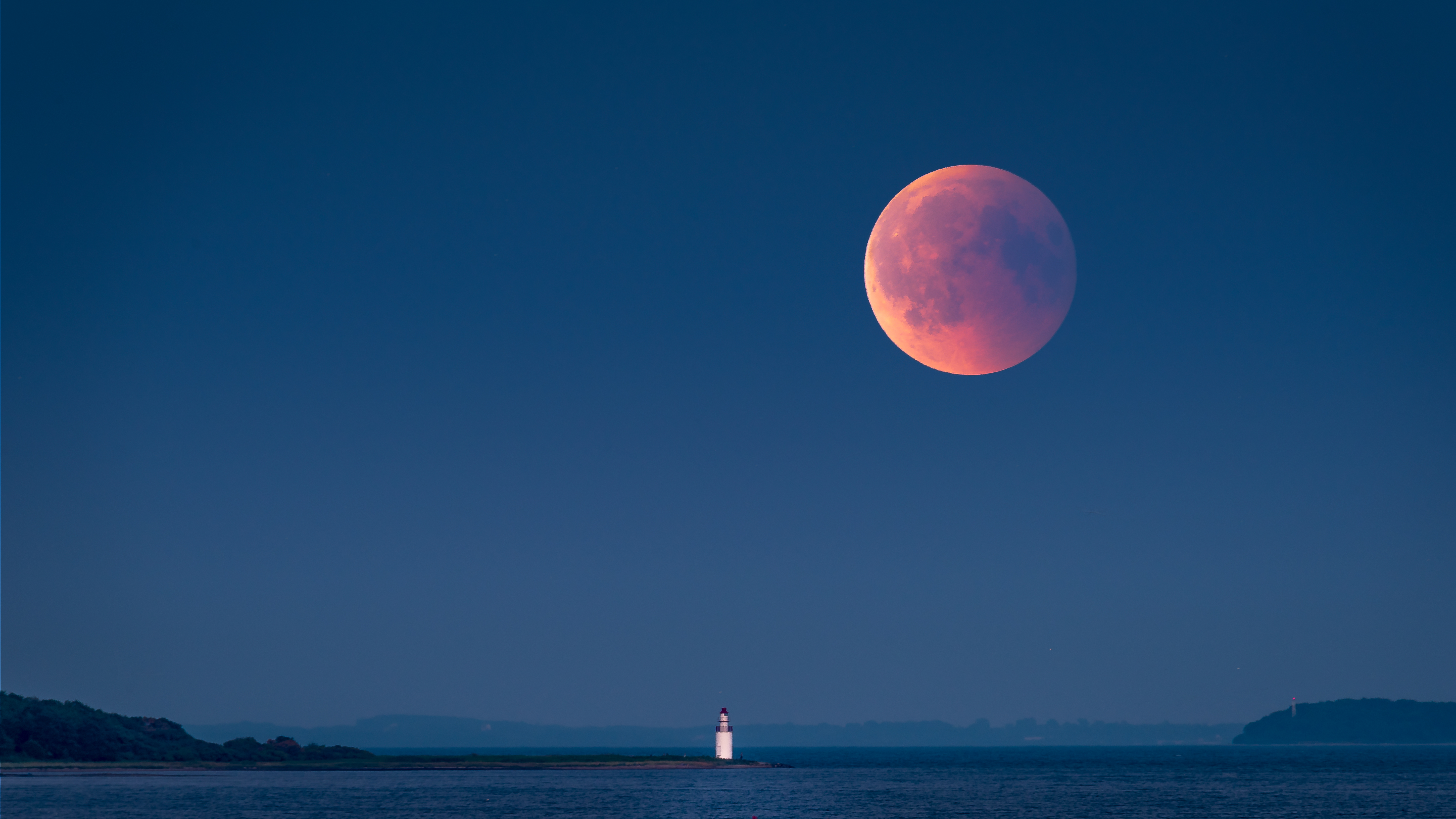 Large red moon rising