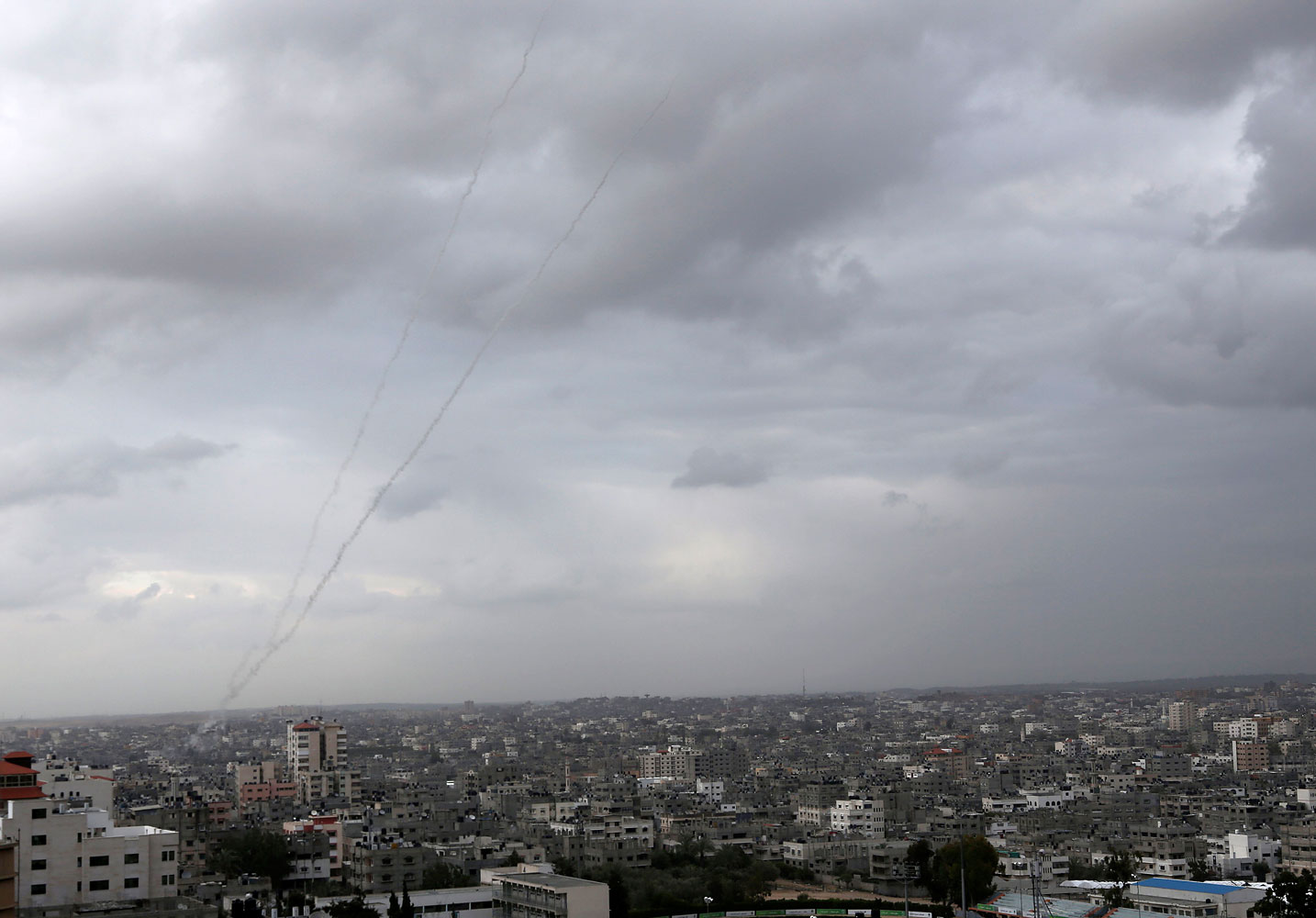 A trail of smoke from rockets fired by Palestinian militants from Gaza toward Israel is seen above Gaza City on March 12, 2014.