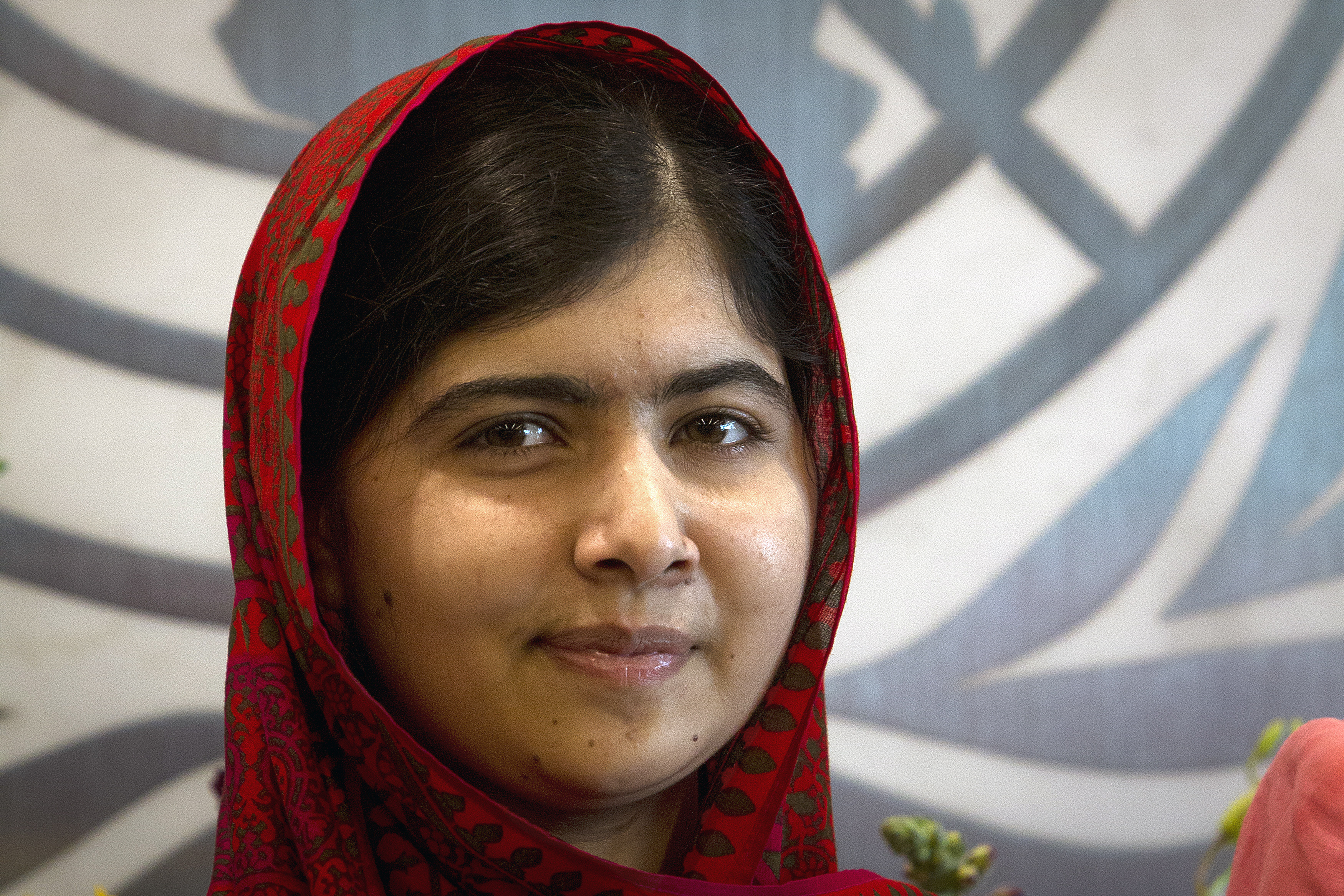 Pakistani schoolgirl activist Malala Yousafzai poses for pictures during a photo opportunity at the United Nations in the Manhattan borough of New York