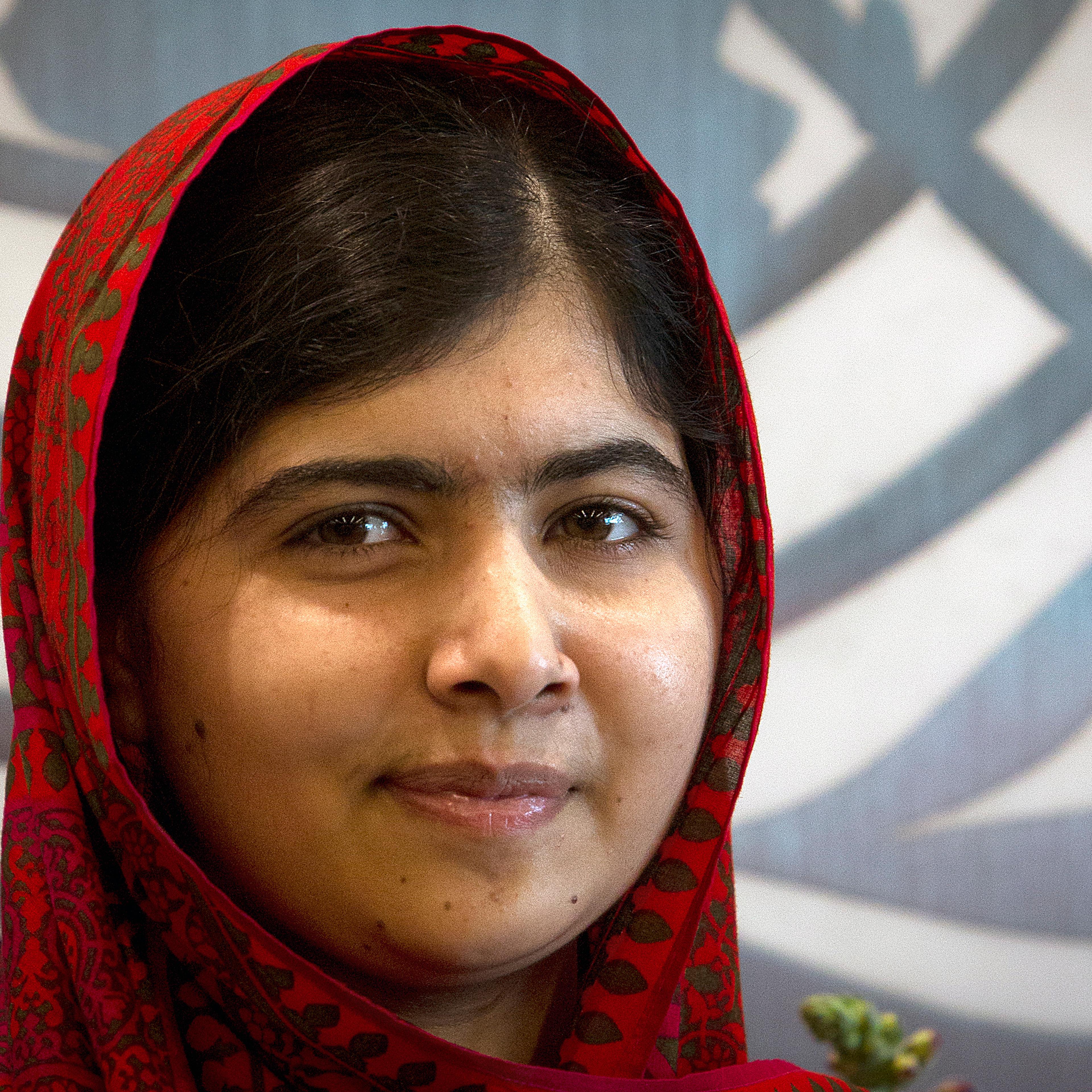 Pakistani schoolgirl activist Malala Yousafzai poses for pictures during a photo opportunity at the United Nations in the Manhattan borough of New York