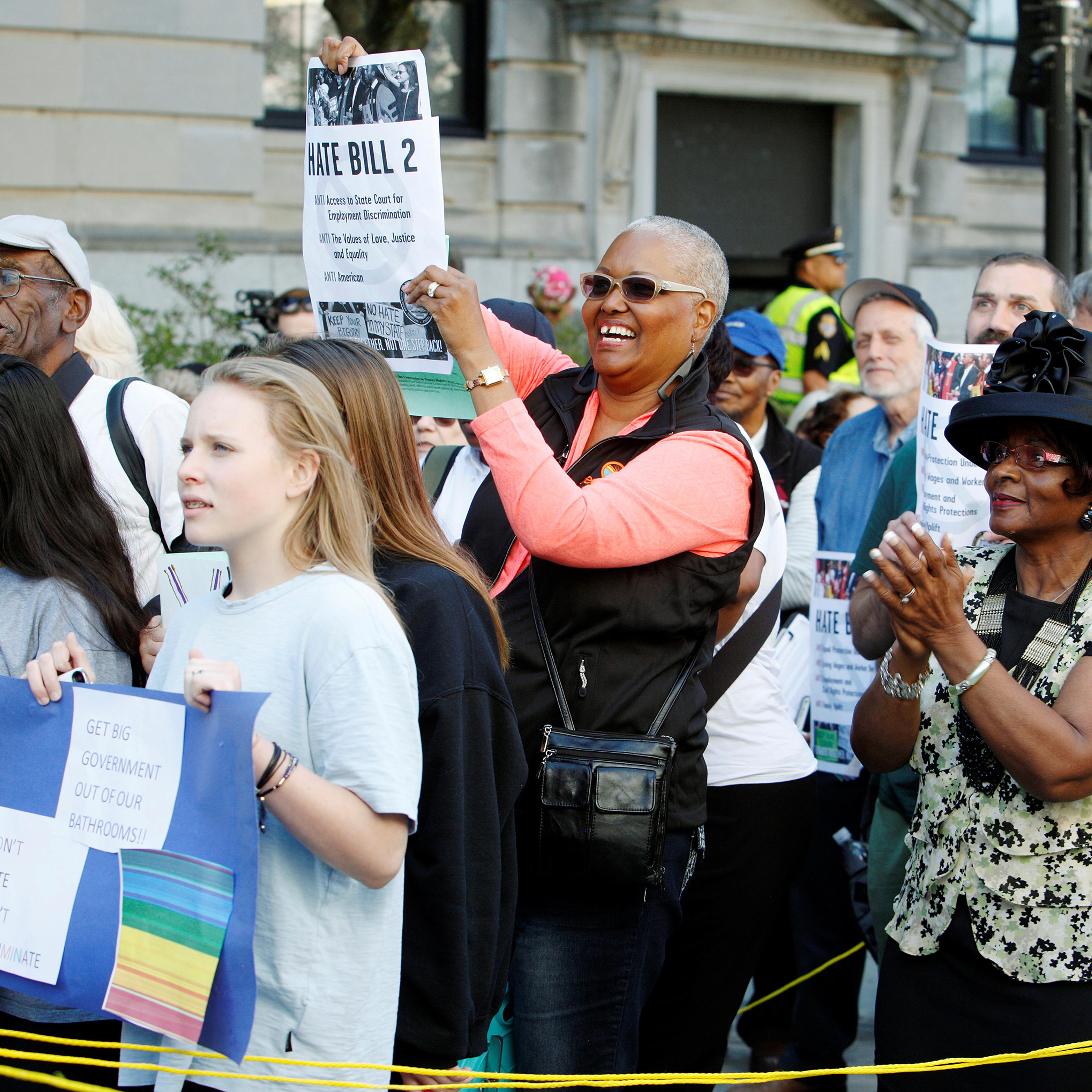 A crowd of protesters opposing North Carolina's HB2 "bathroom law" that restricts members of the LGBT community from using the bathroom of their choice, during a demonstration outside the state legislature in Raleigh, North Carolina on May 16, 2016.