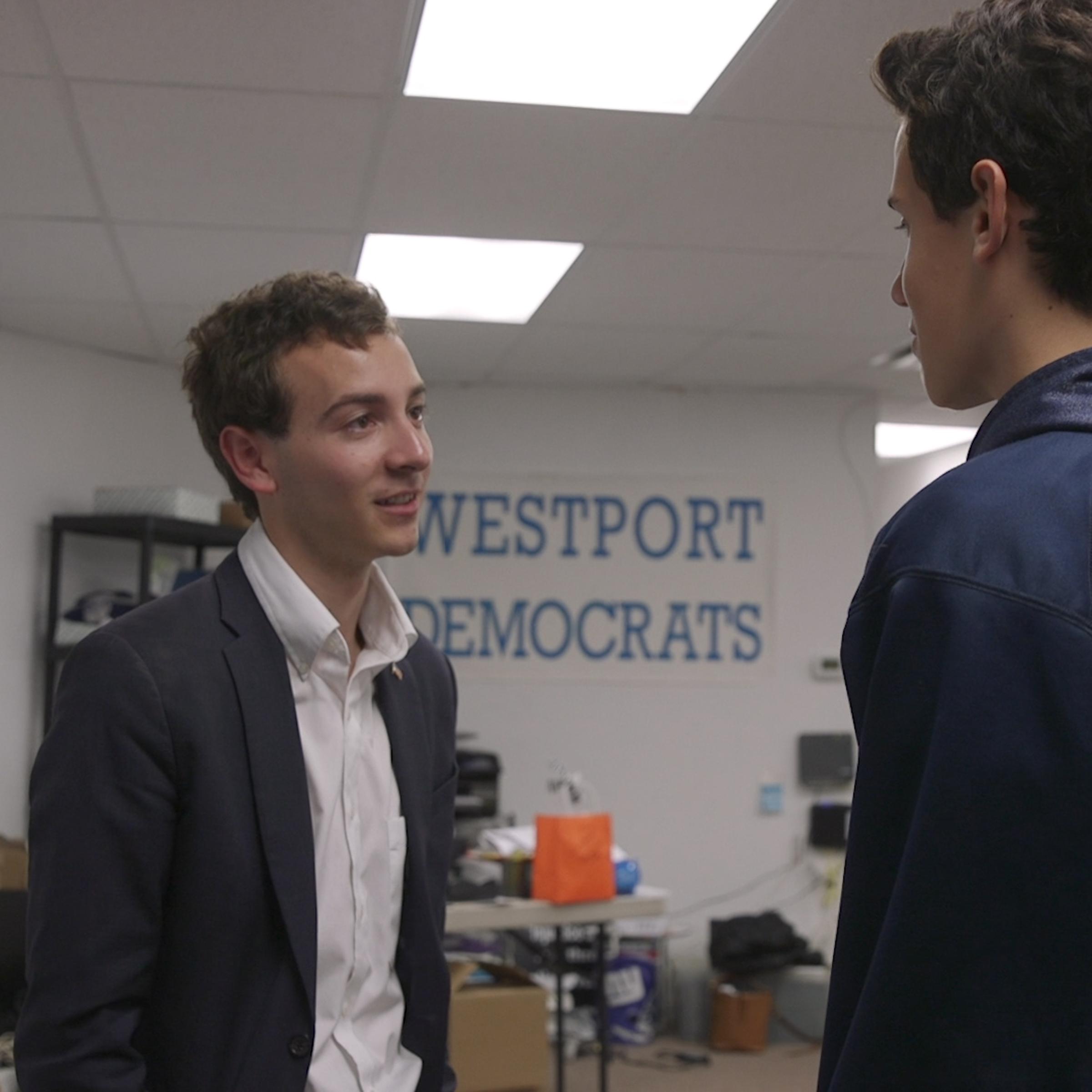 22-year-old Connnecticut state Senate candidate Will Haskell speaks with a campaign volunteer during a phone bank in Westport, CT on Oct. 30, 2018.