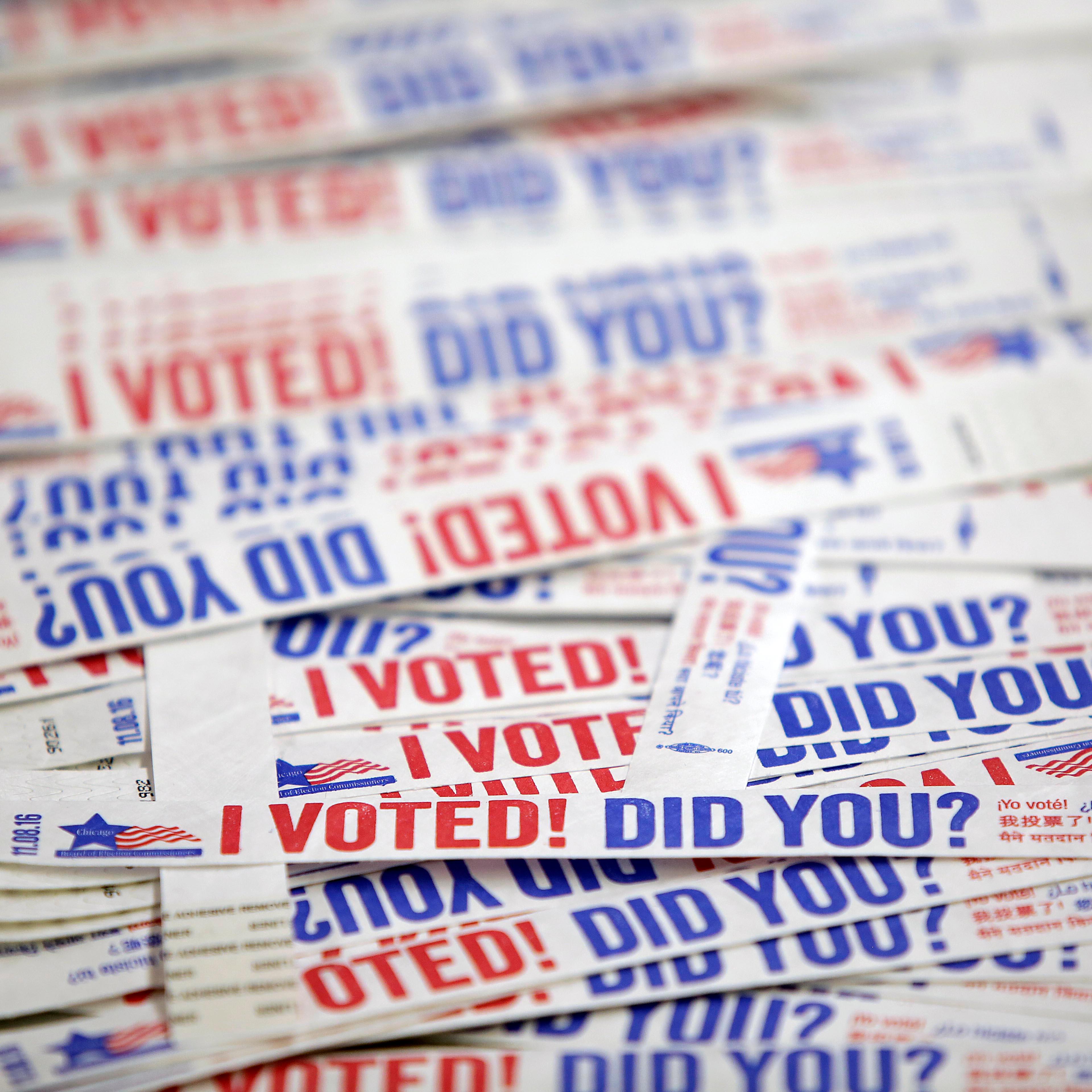 Wristbands for voters after they cast their ballot are seen during early voting at a polling station, on Oct. 31, 2016 in Chicago.