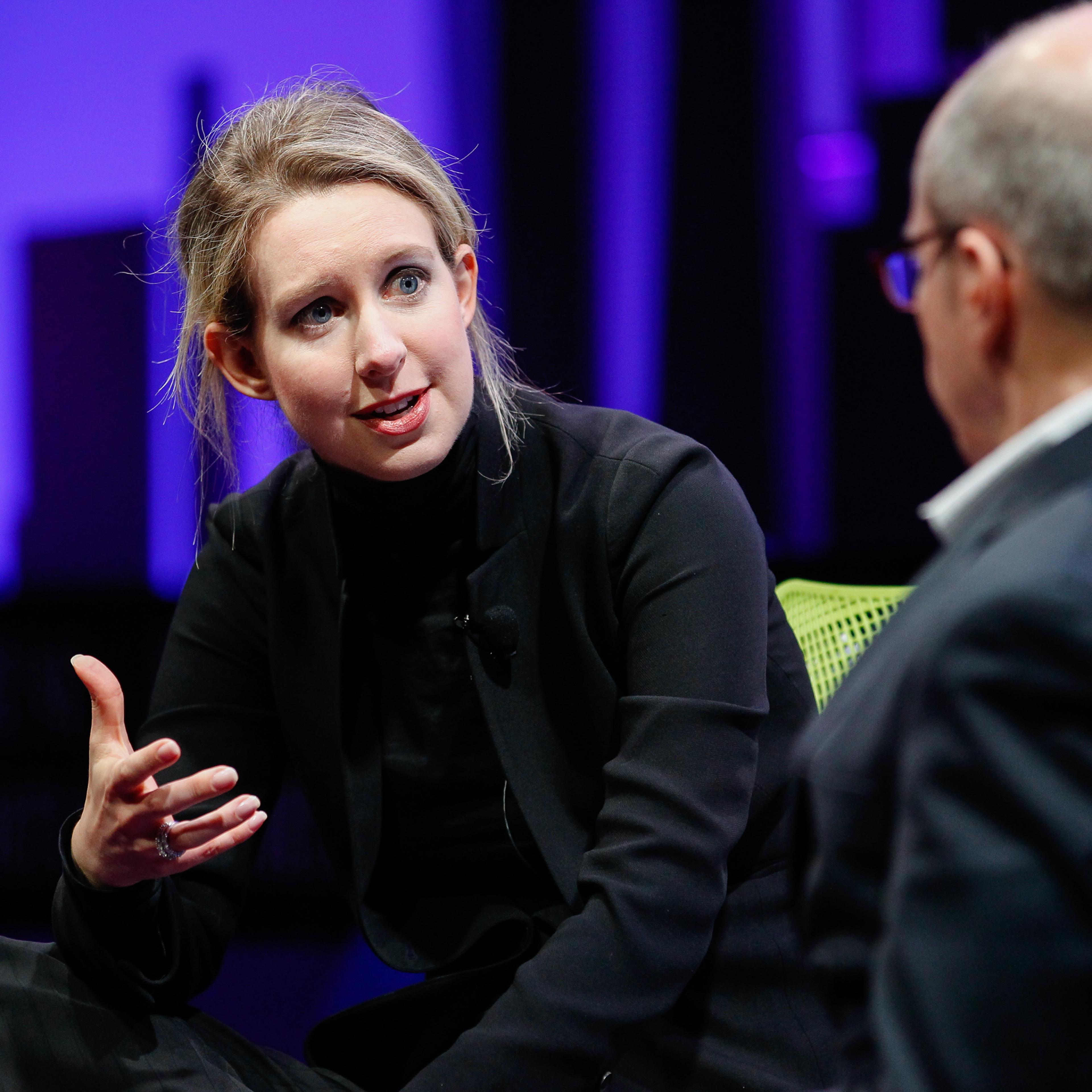Elizabeth Holmes (L) and Alan Murray speak at the Fortune Global Forum at the Fairmont Hotel on November 2, 2015 in San Francisco, California.