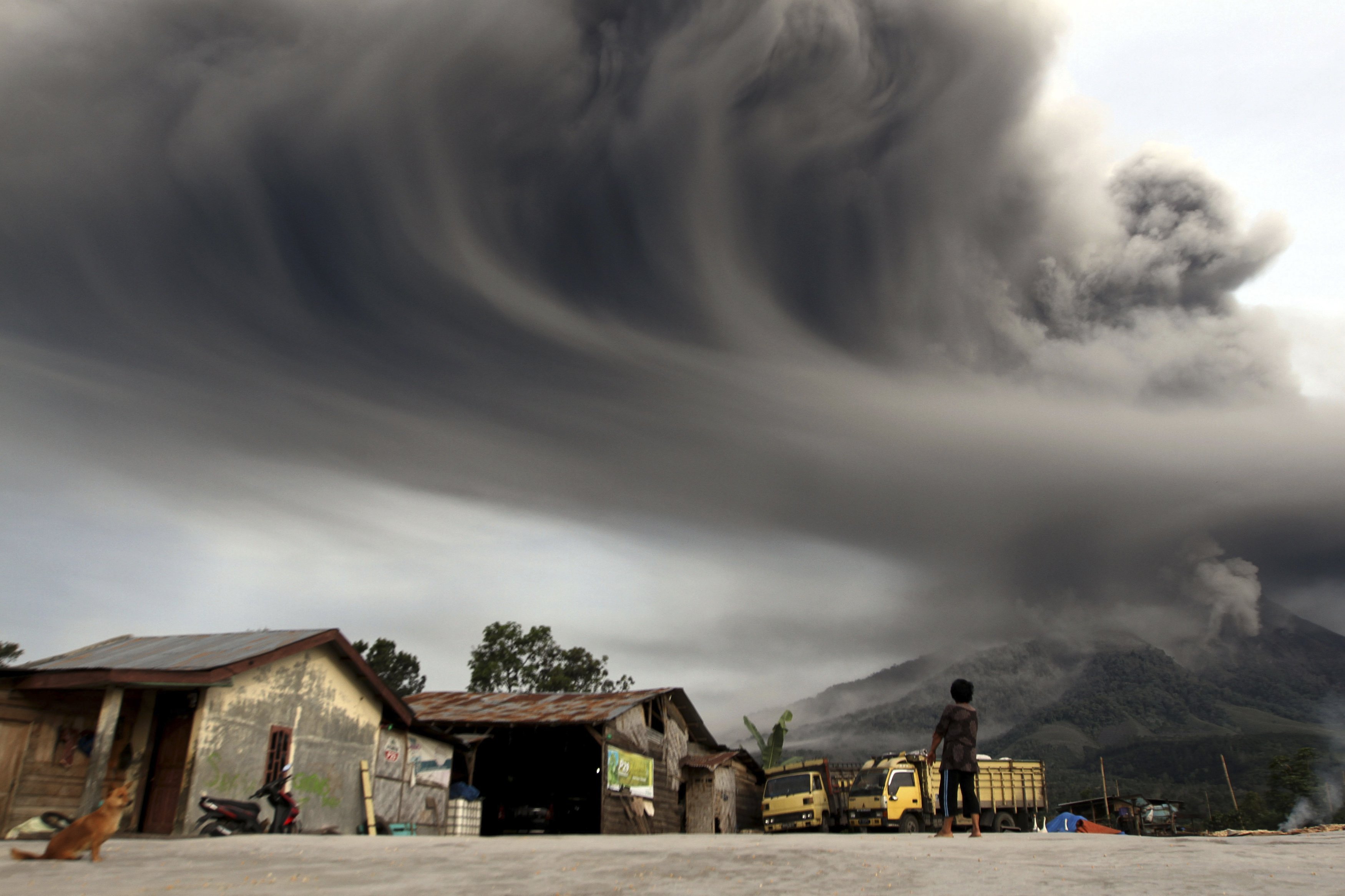 Indonesian Volcanoes Mount Sinabung and Mount Merapi Erupt