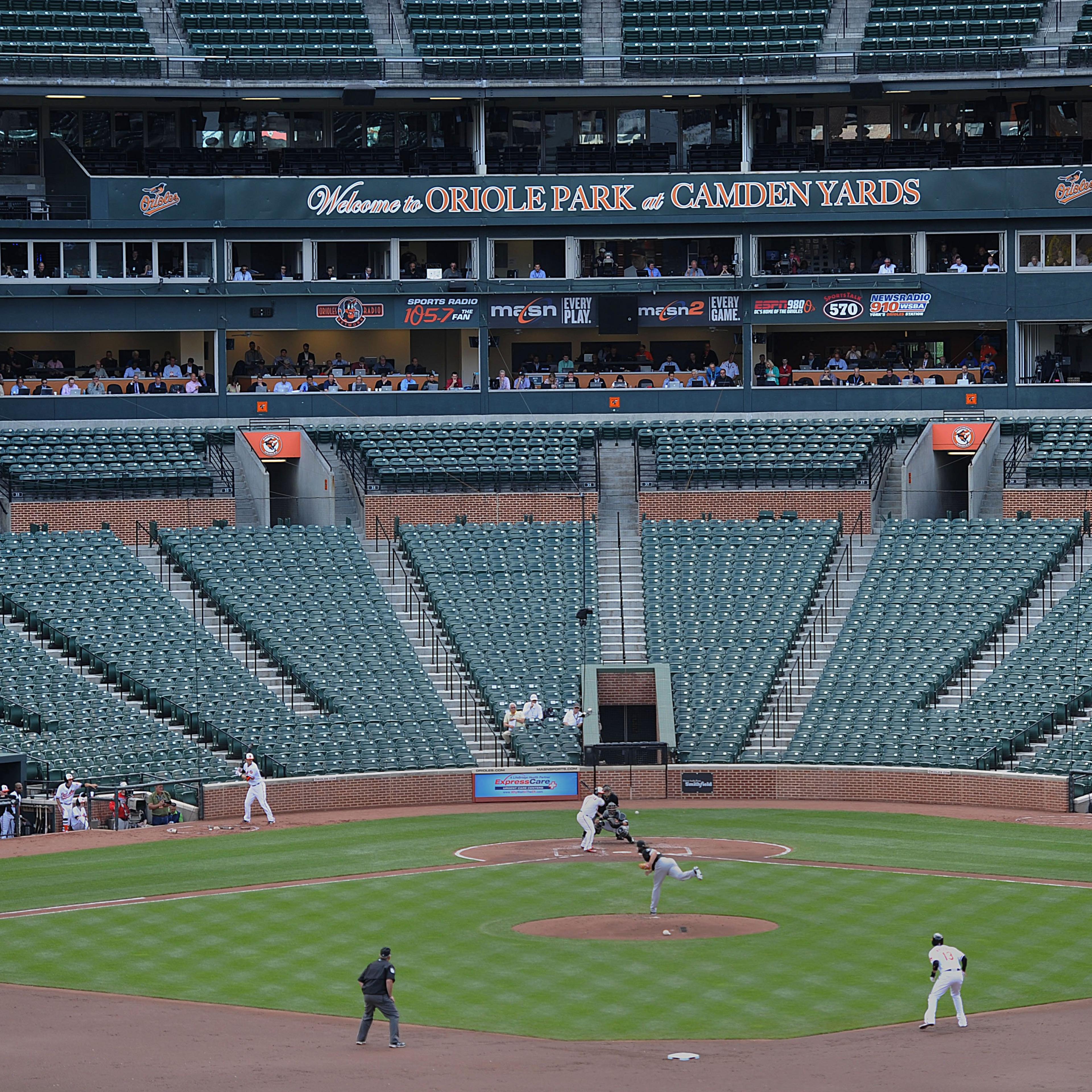 The Baltimore Orioles bat against the Chicago White Sox during a baseball game without fans on April 29, 2015, in Baltimore. Due to security concerns the game was closed to the public.