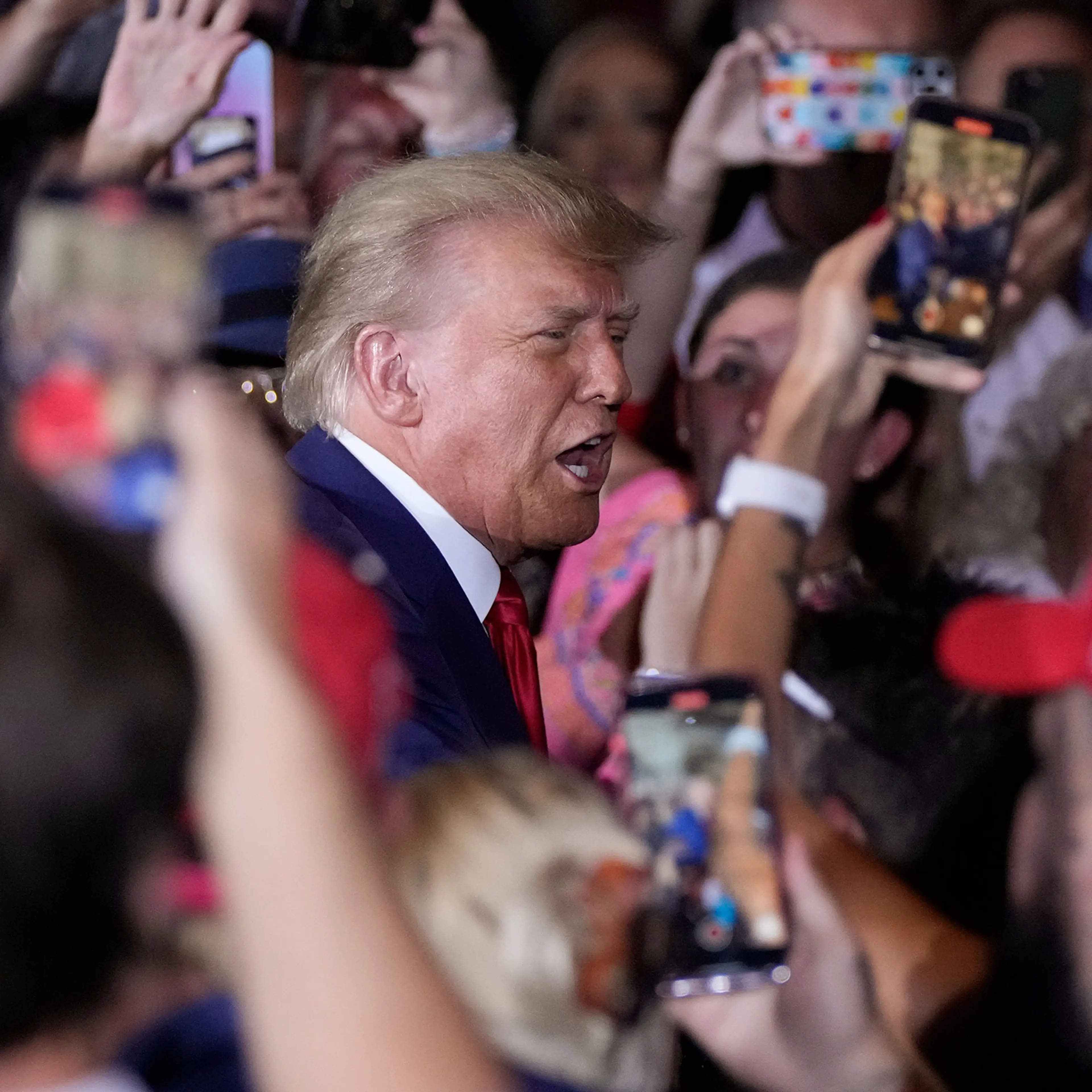 Former President Donald Trump arrives to speak at his Mar-a-Lago estate hours after being arraigned in New York City, in Palm Beach, Fla., on April 4, 2023.