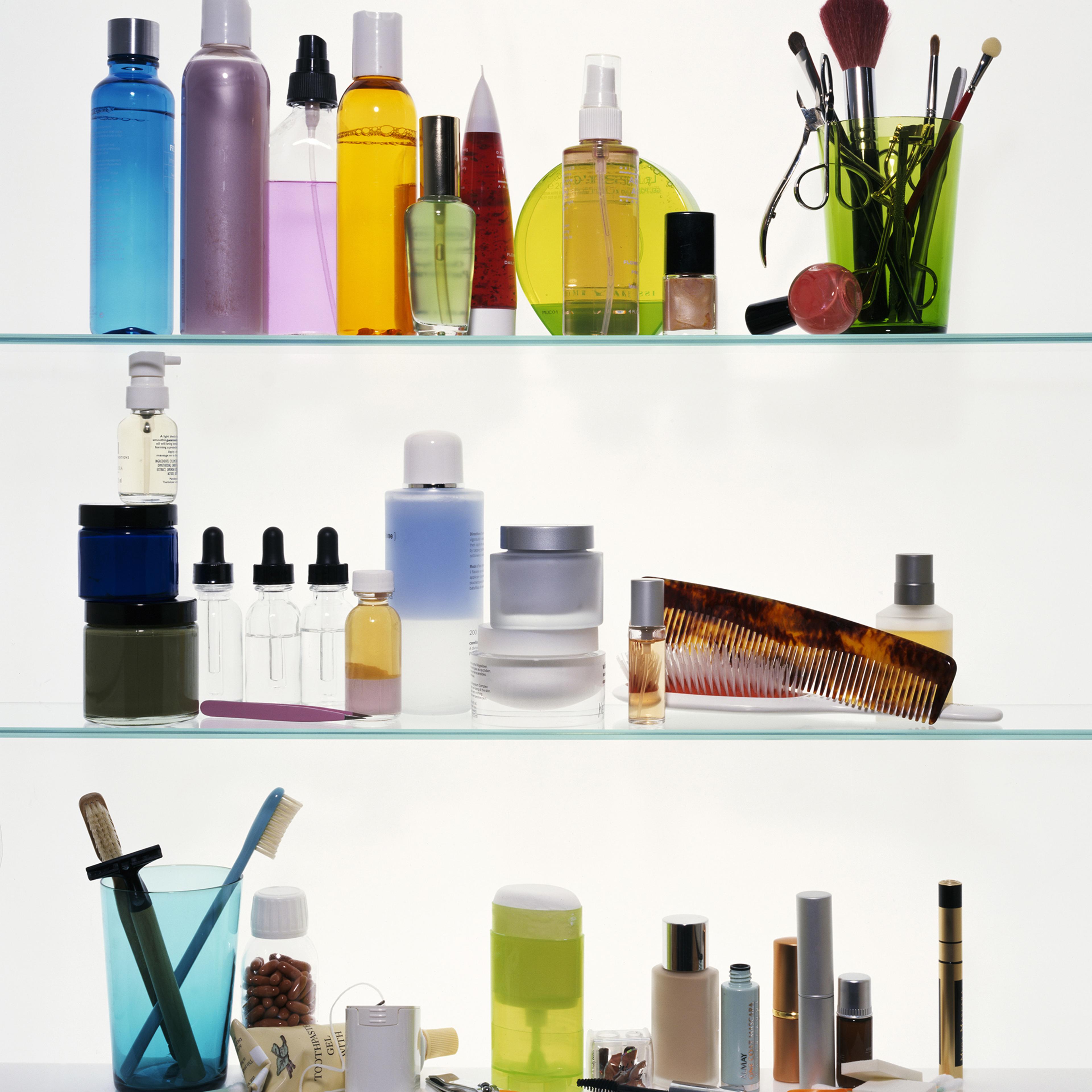 Toilet items sitting on shelves