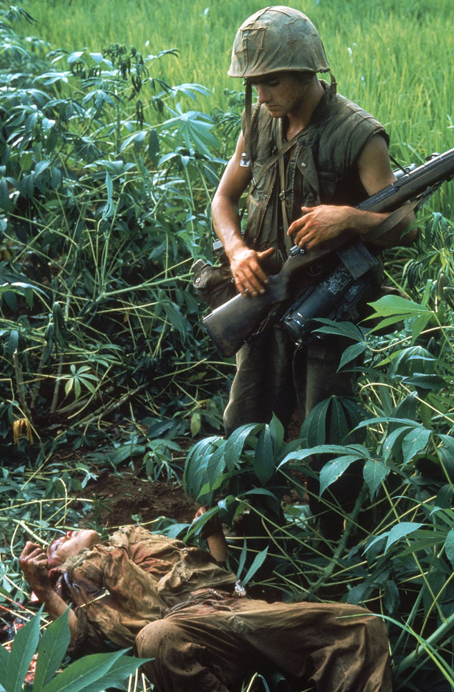 Vietnam War: Looking Again at Larry Burrows' Photo, 'Reaching Out'