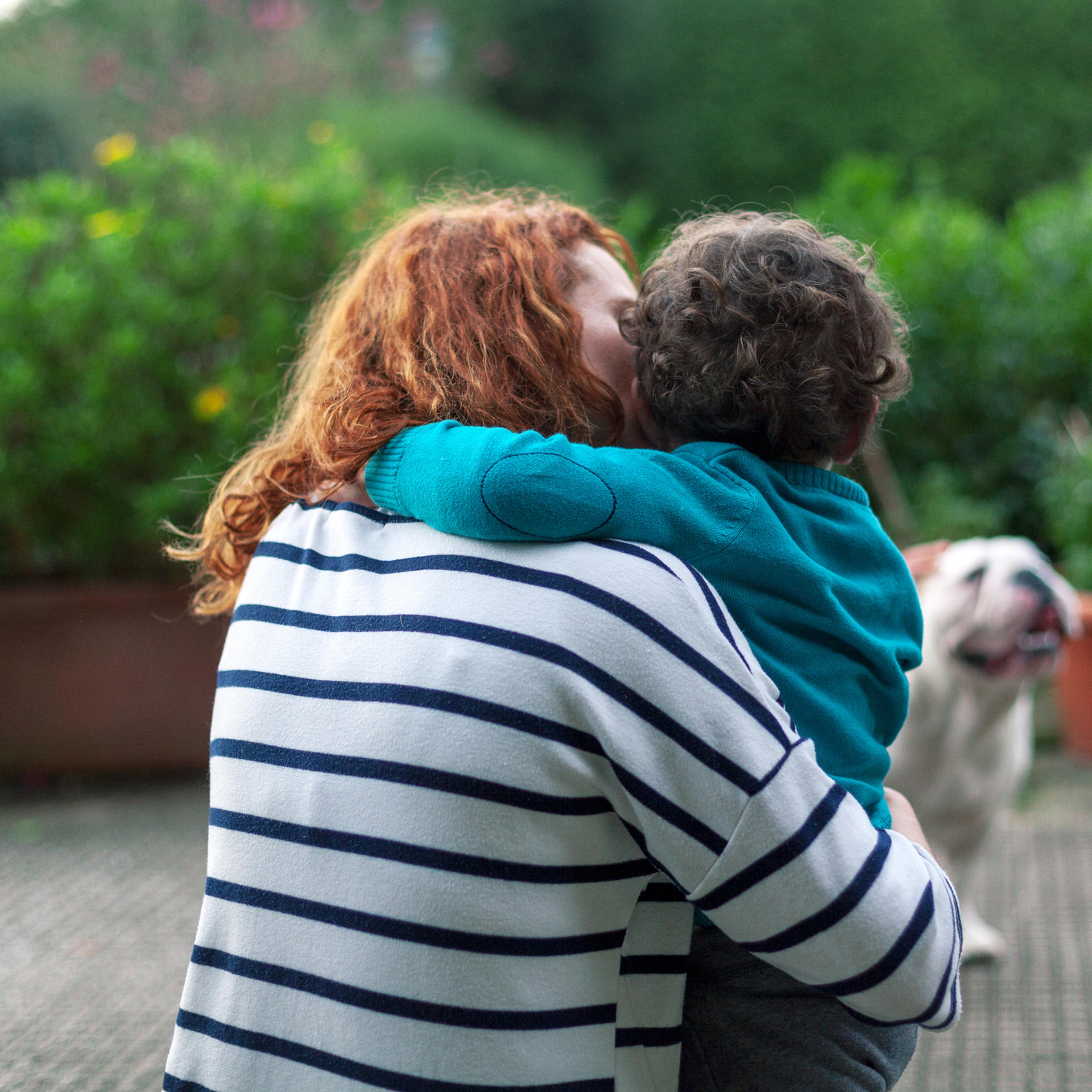 A mother and son outdoors