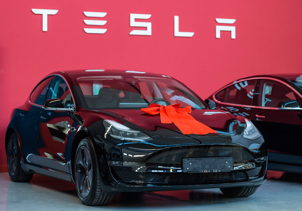 A Tesla Model 3 located in a Tesla Service Center in Frankfurt