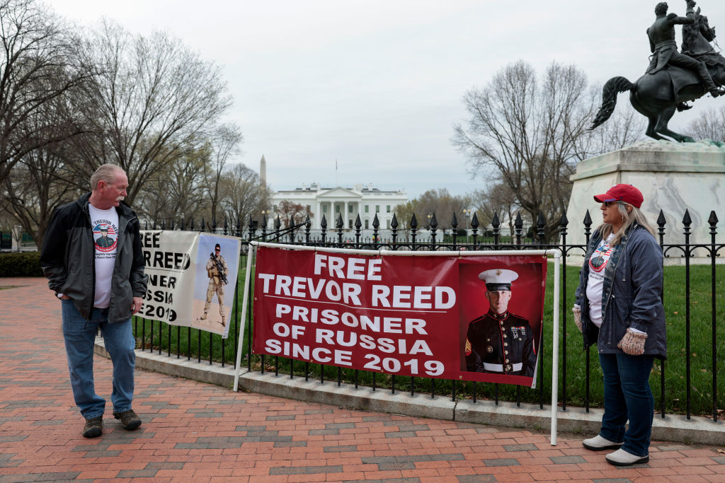 Parents Of Marine Being Held In Russia Protest Outside White House