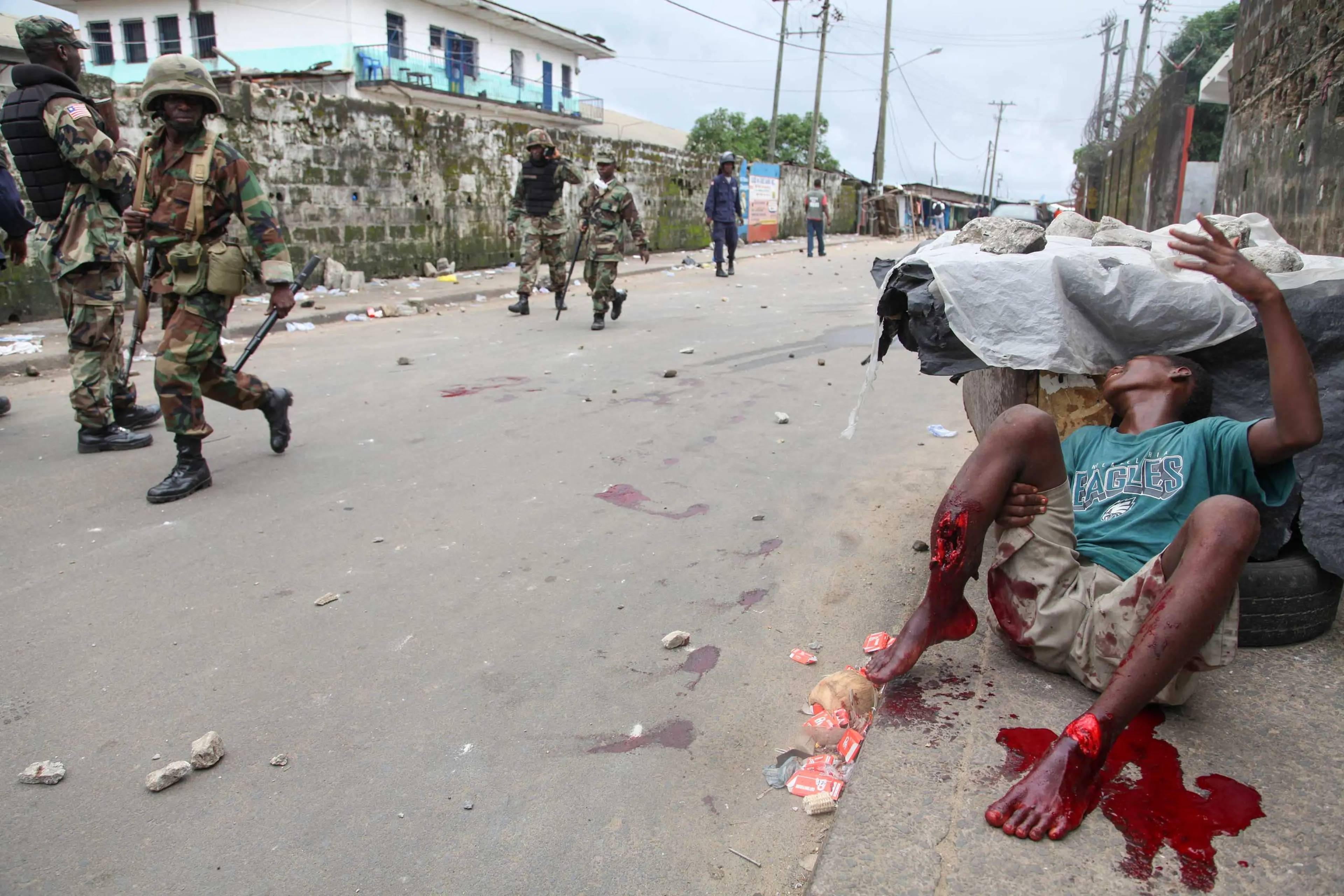 Ahmed Jallanzo, Aug. 20, 2014. Monrovia, Liberia."Violence had broken out in the slum township of West Point as the government tried to quarantine tens of thousands of residents in order to stop the spread of the deadly Ebola virus. As I walked through t