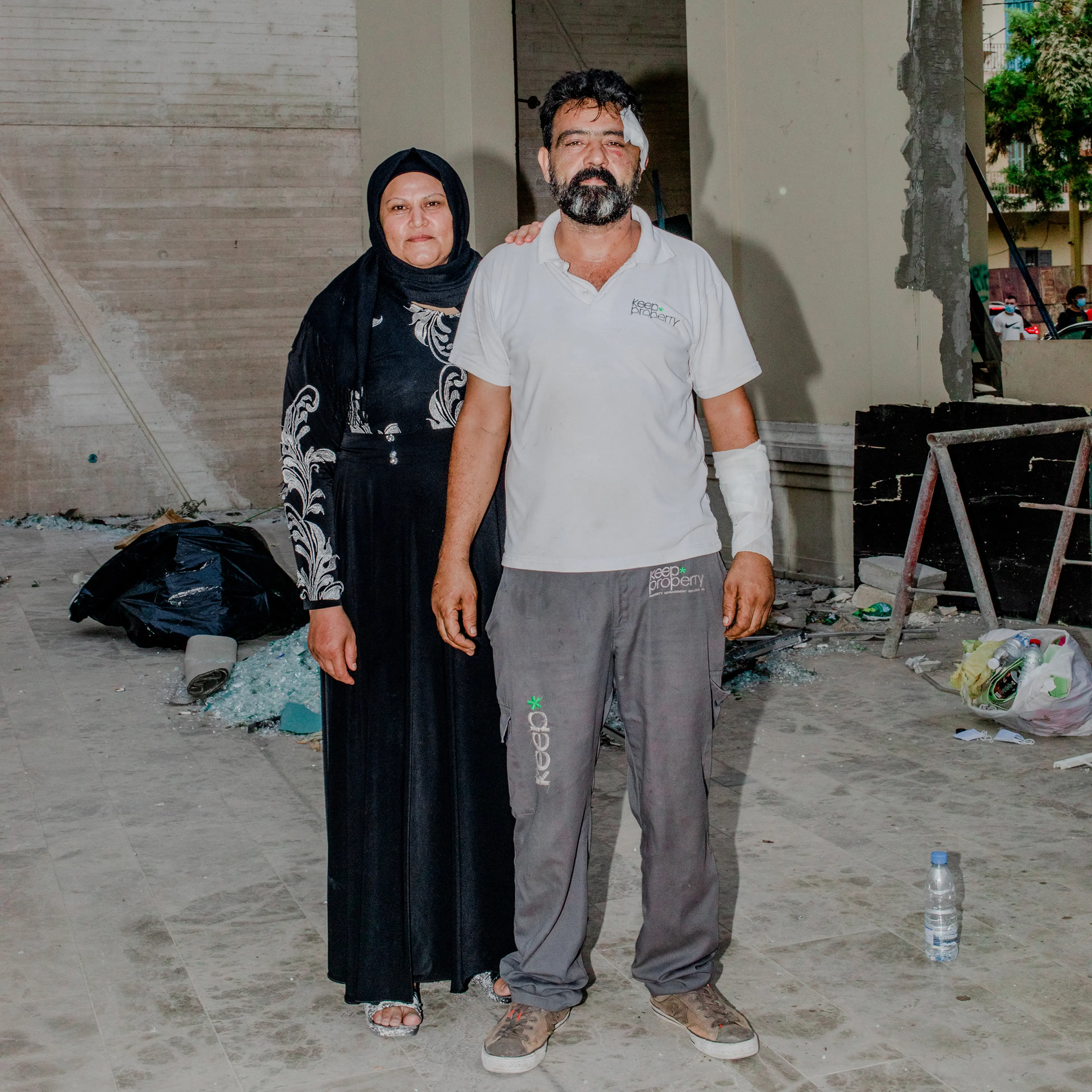 Riad Hussein Al Hussein and his wife Fatima Al Abid in the Mar Mikhael neighborhood of Beirut on Aug. 7. He was buying vegetables there three days earlier when he heard a small explosion. He asked the seller whether he thought it was a shell or a bomb, a