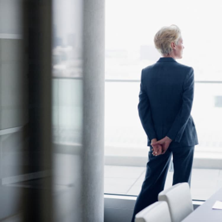 business-woman-standing-rear-view