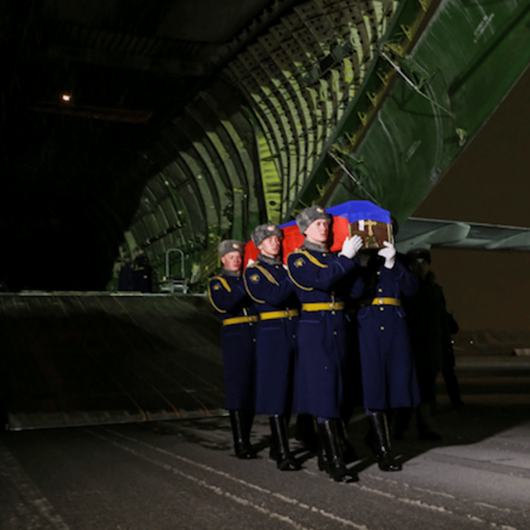The body of Russian pilot Oleg Peshkov arrived in Moscow on Monday.