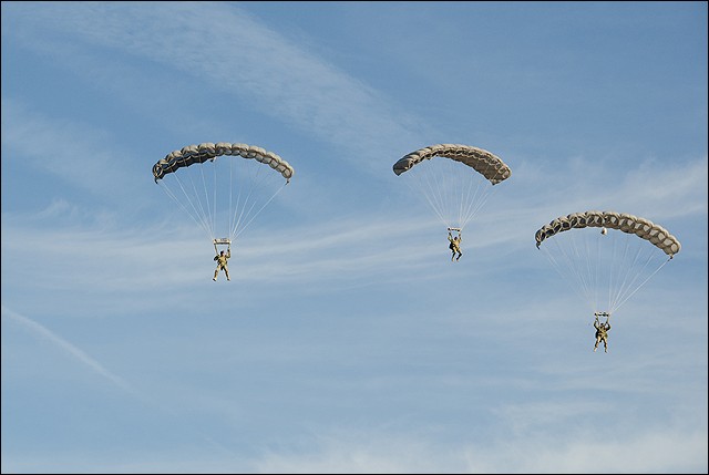 Members of the FBI's Hostage Rescue Team practice their parachuting skills.