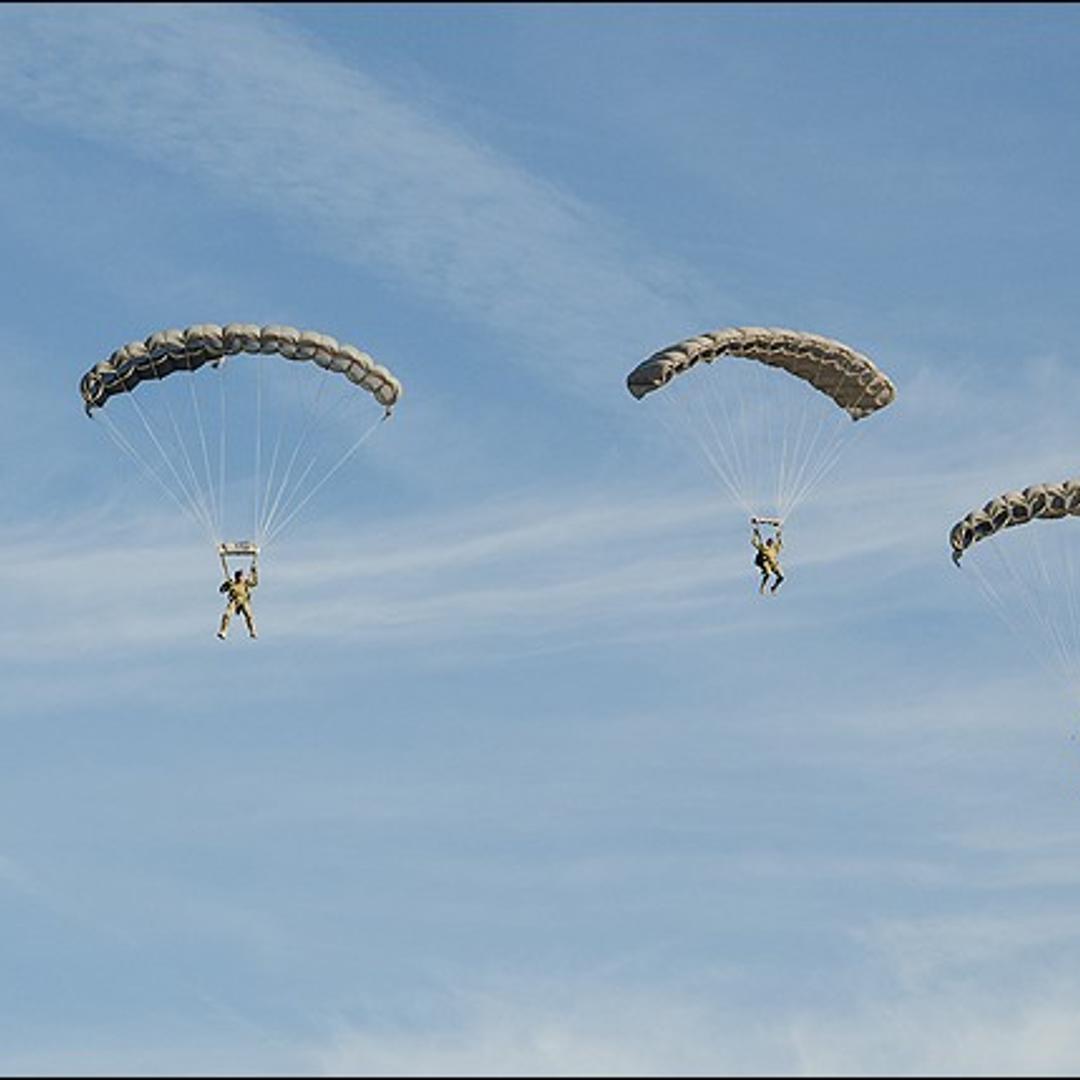 Members of the FBI's Hostage Rescue Team practice their parachuting skills.