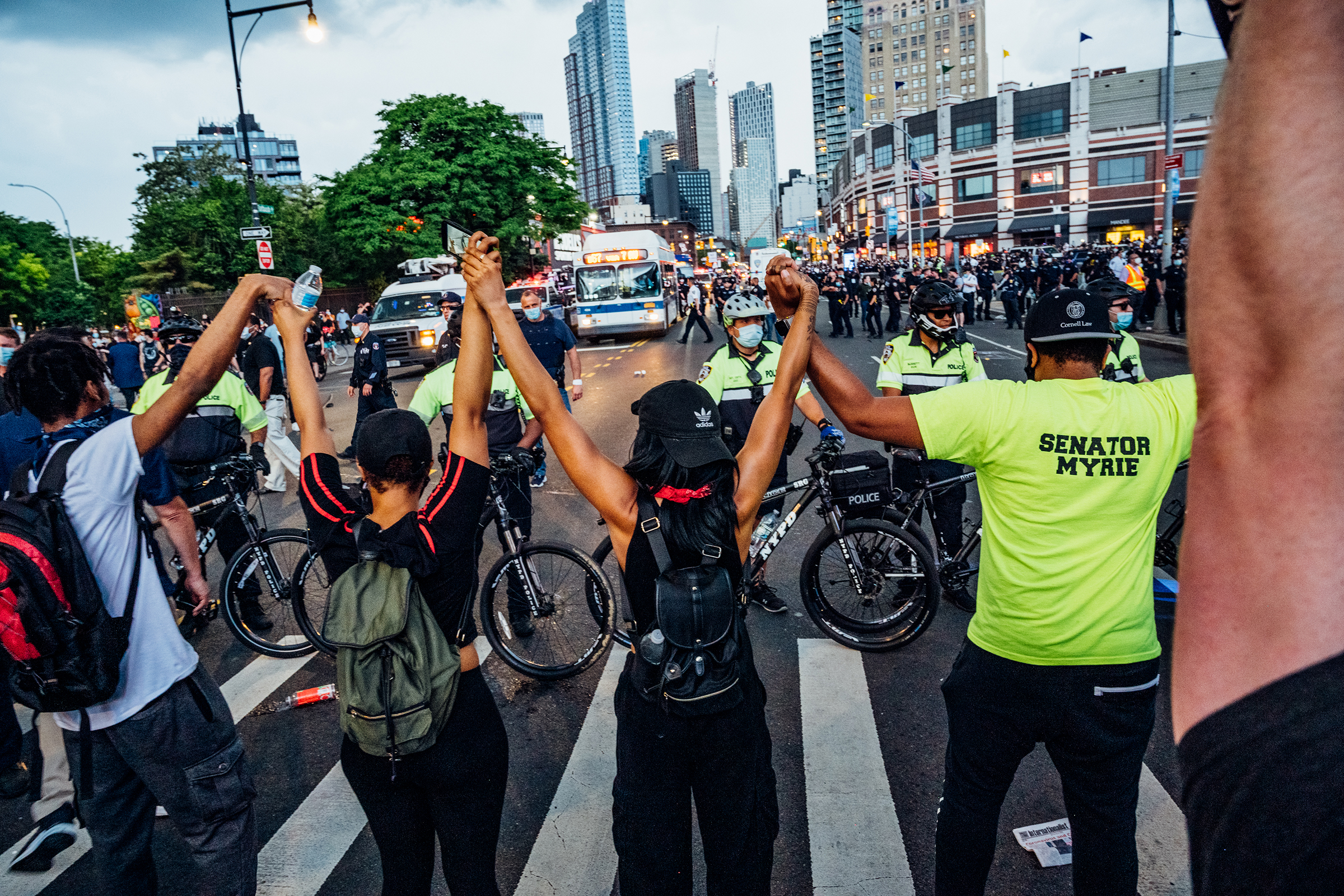Protesters join hands while blocking an intersection near Brooklyn's Barclays Center on May 29.