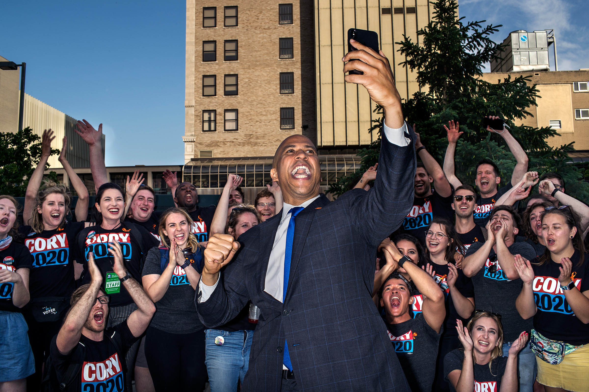 Senator Cory Booker records a video with supporters, staff, and volunteers after the Democratic Hall of Fame event