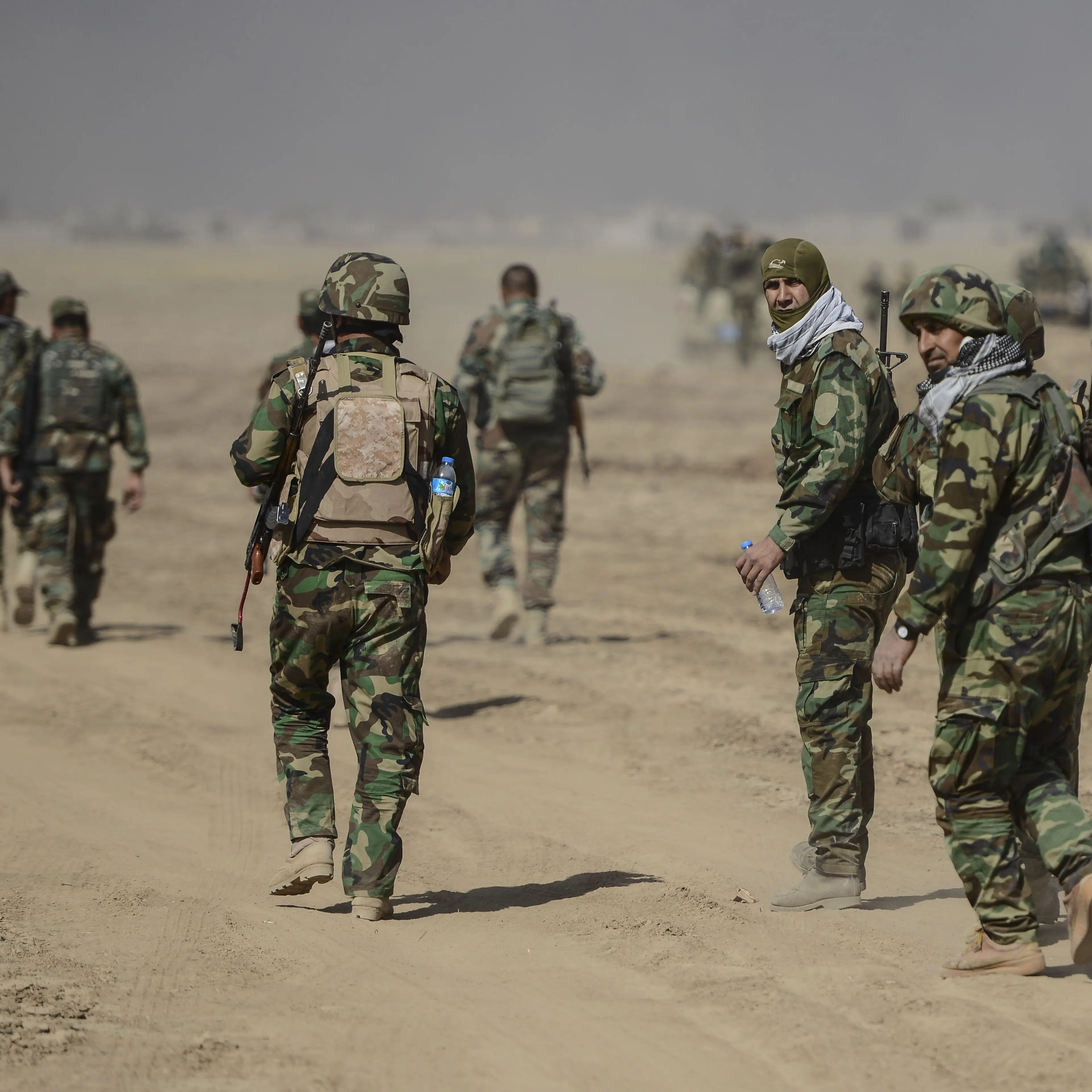 Peshmerga forces are seen at the Tarjala village as they attack on Deash targets during an operation to liberate Mosul from Daesh terrorist organization on October 17, 2016.