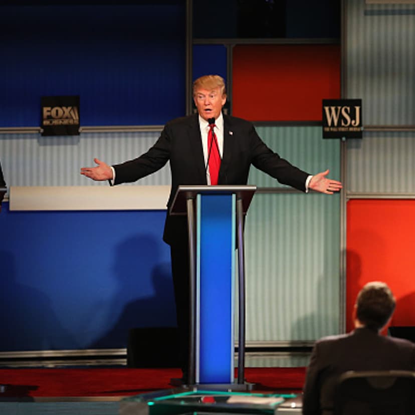 Presidential candidate Donald Trump (C) speaks while Sen. Marco Rubio (L) (R-FL), and Ben Carson look on during the Republican Presidential Debate sponsored by Fox Business and the Wall Street Journal at the Milwaukee Theatre November 10, 2015 in Milwauk