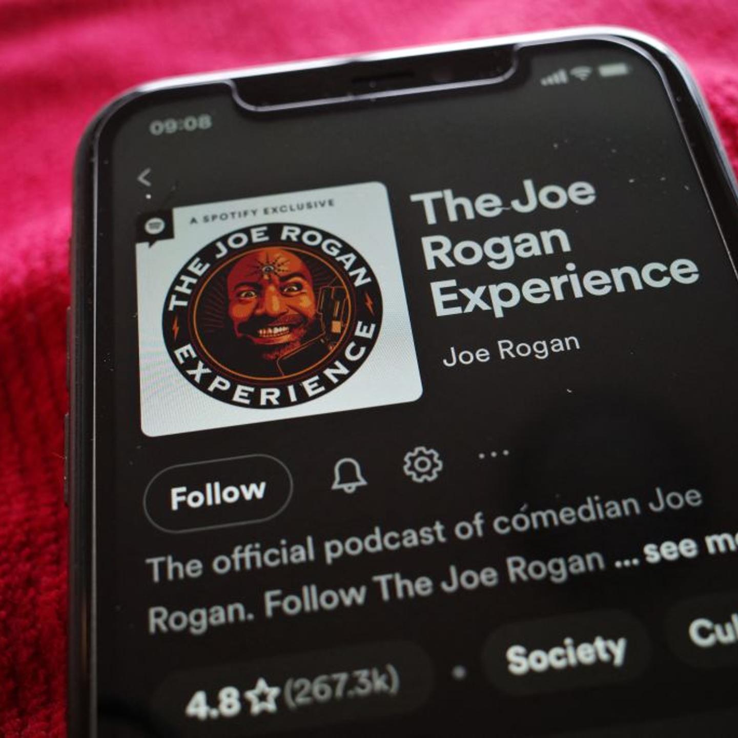 An illustration photo showing the Spotify page for "The Joe Rogan Experience" podcast displayed on a smart phone in Washington, DC on February 7, 2022.