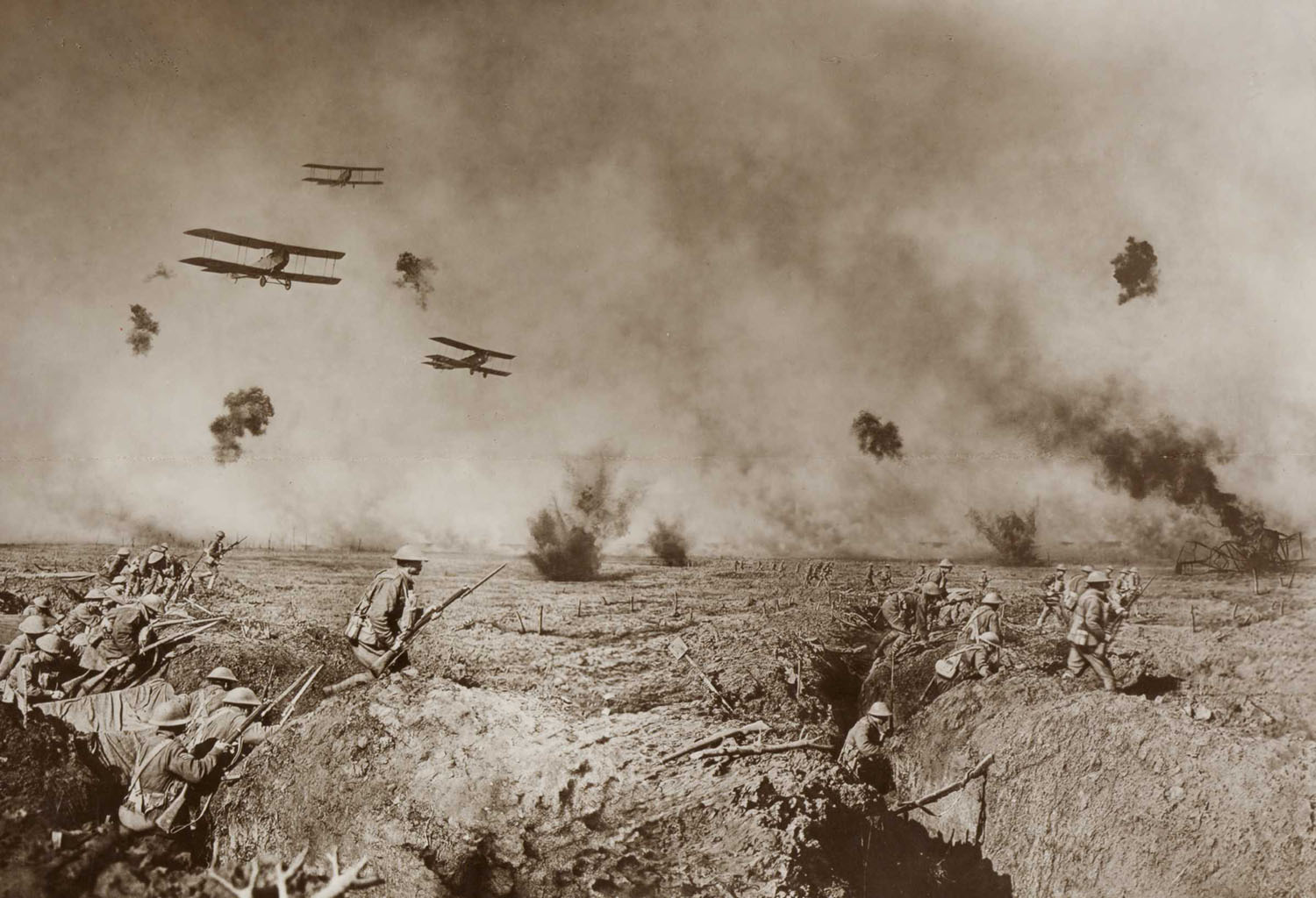 <i>An episode after the Battle of Zonnebeke. Australian Infantry moving forward to resist a counter attack. On the extreme right a machine brought down in flames is burning fiercely. Our advance is supported by bombing planes, whilst the enemy is supporting his attack with a heavy barrage.
</br>
c. 1918 </i></br>
James Frank Hurley, Australian, 1885–1962
