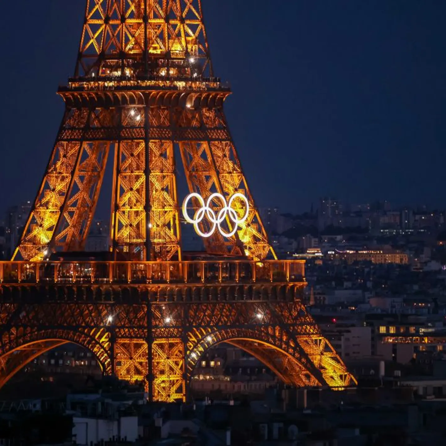 The Olympic rings light up on the Eiffel Tower in Paris on August 2, 2024.