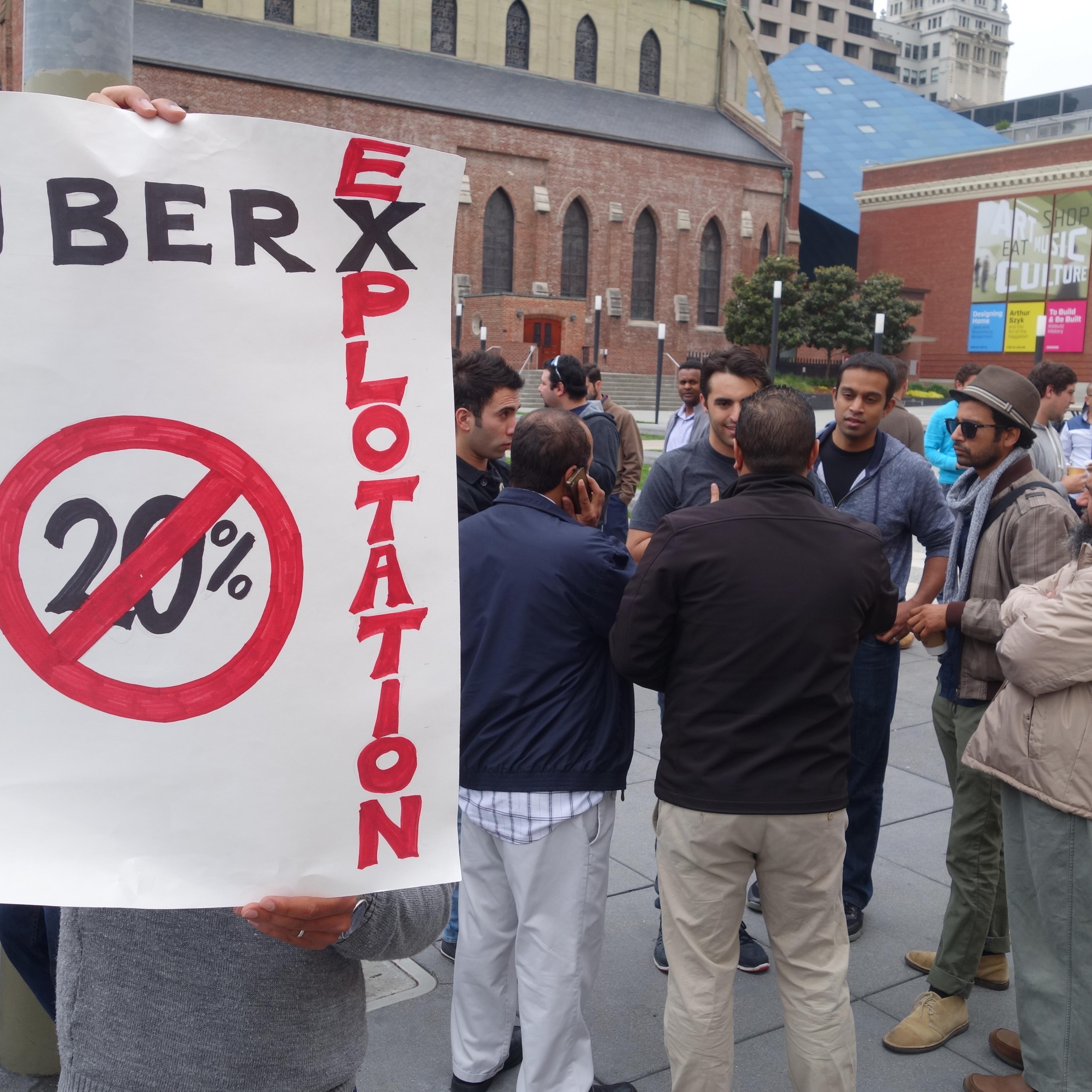 UberX drivers protest outside Uber headquarters in San Francisco on May 8, 2014.