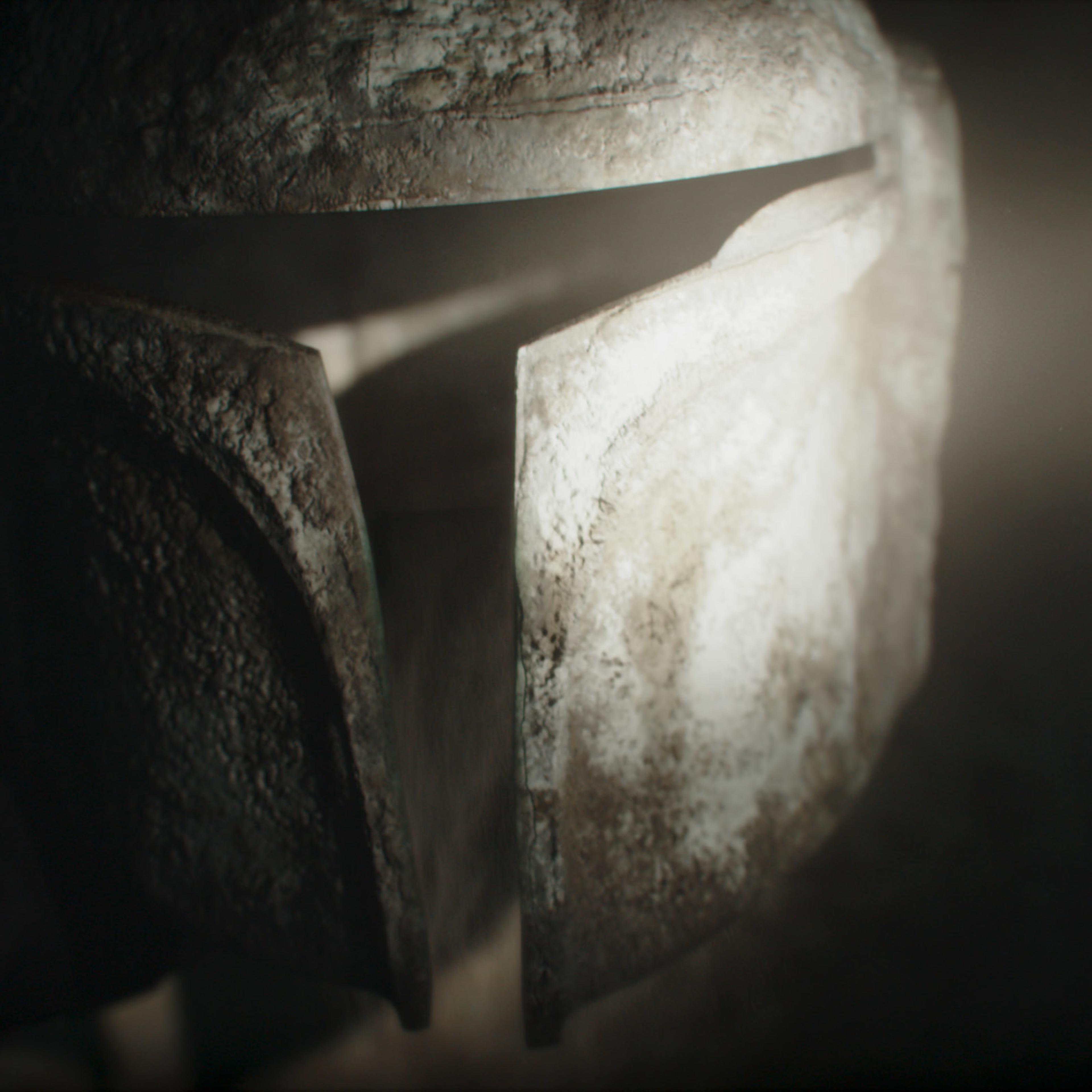A Mandalorian helmet from a scene in 'The Mandalorian' season 3