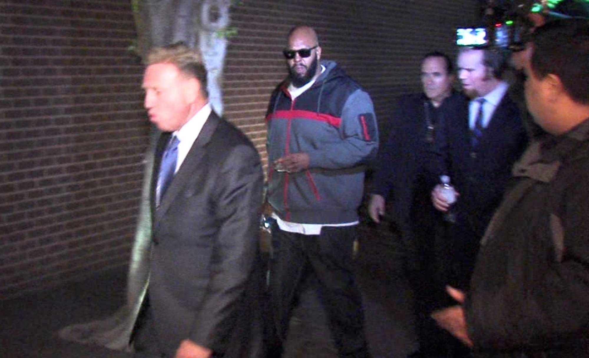 Death Row Records founder Marion "Suge" Knight walking into the Los Angeles County Sheriffs department early Friday morning Jan. 30, 2015 in connection with a hit-and-run incident that left one man dead and another injured.