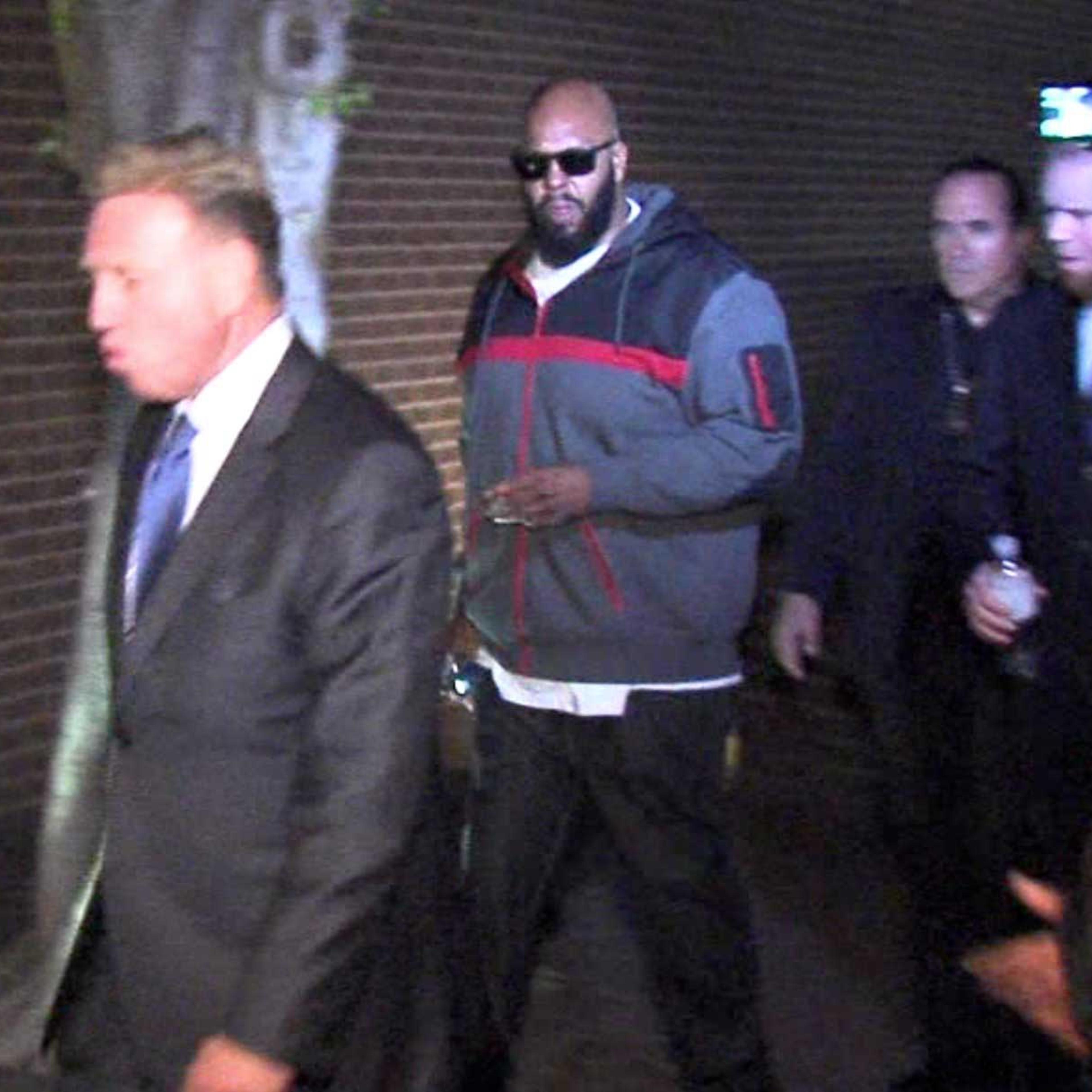 Death Row Records founder Marion "Suge" Knight walking into the Los Angeles County Sheriffs department early Friday morning Jan. 30, 2015 in connection with a hit-and-run incident that left one man dead and another injured.