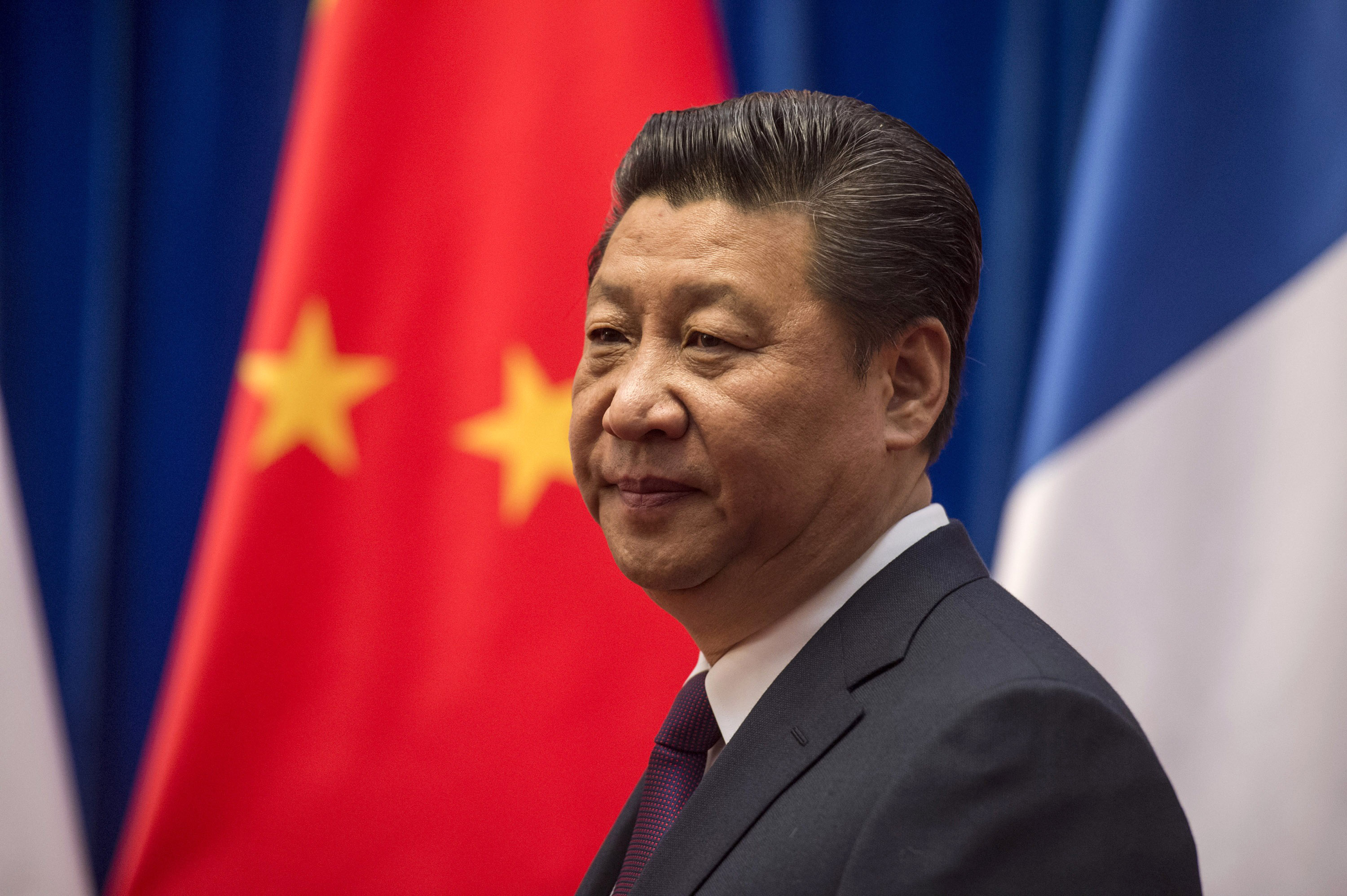 Chinese President Xi Jinping waits to welcome French Prime Minister Manuel Valls at the Great Hall of the People on Jan. 30, 2015 in Beijing