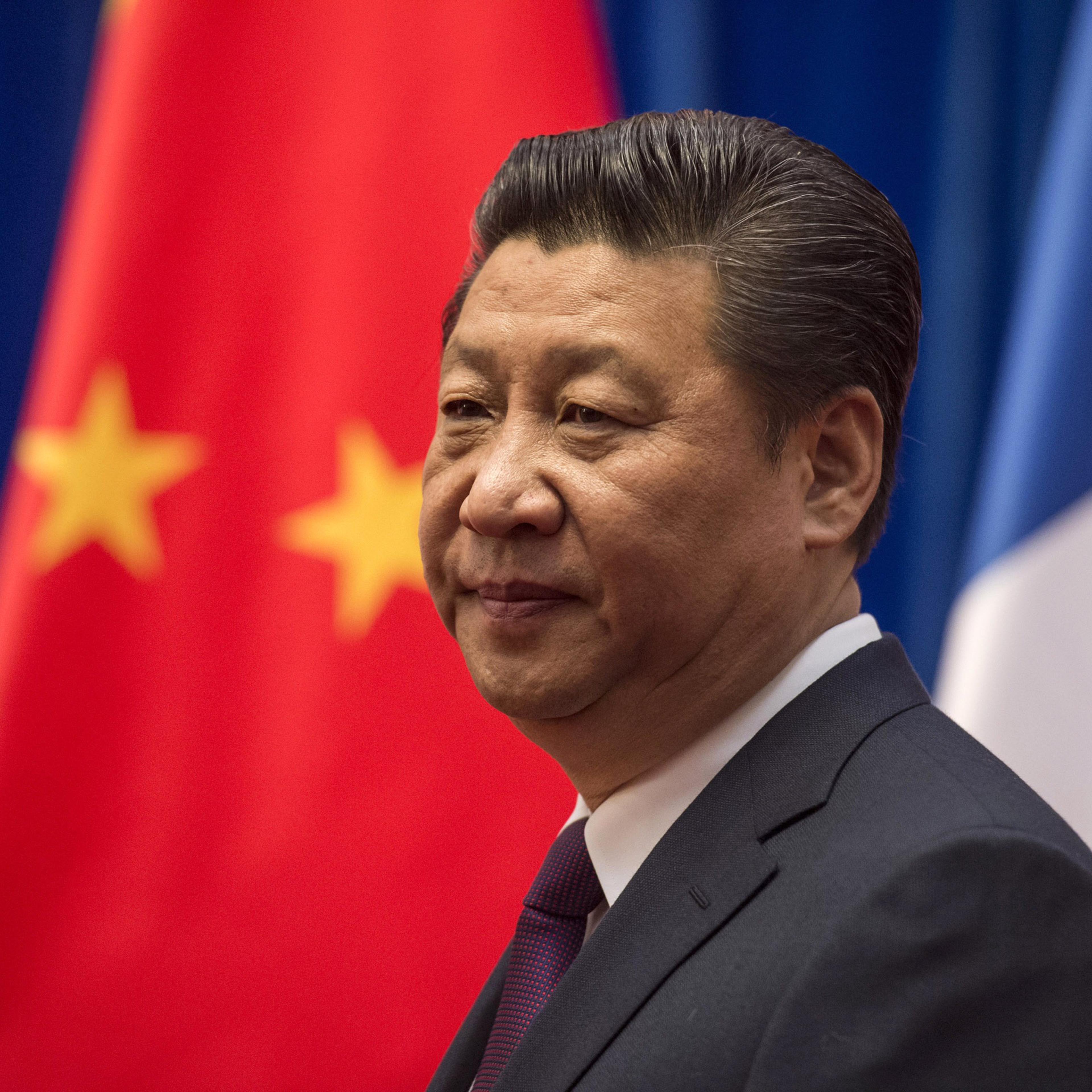 Chinese President Xi Jinping waits to welcome French Prime Minister Manuel Valls at the Great Hall of the People on Jan. 30, 2015 in Beijing