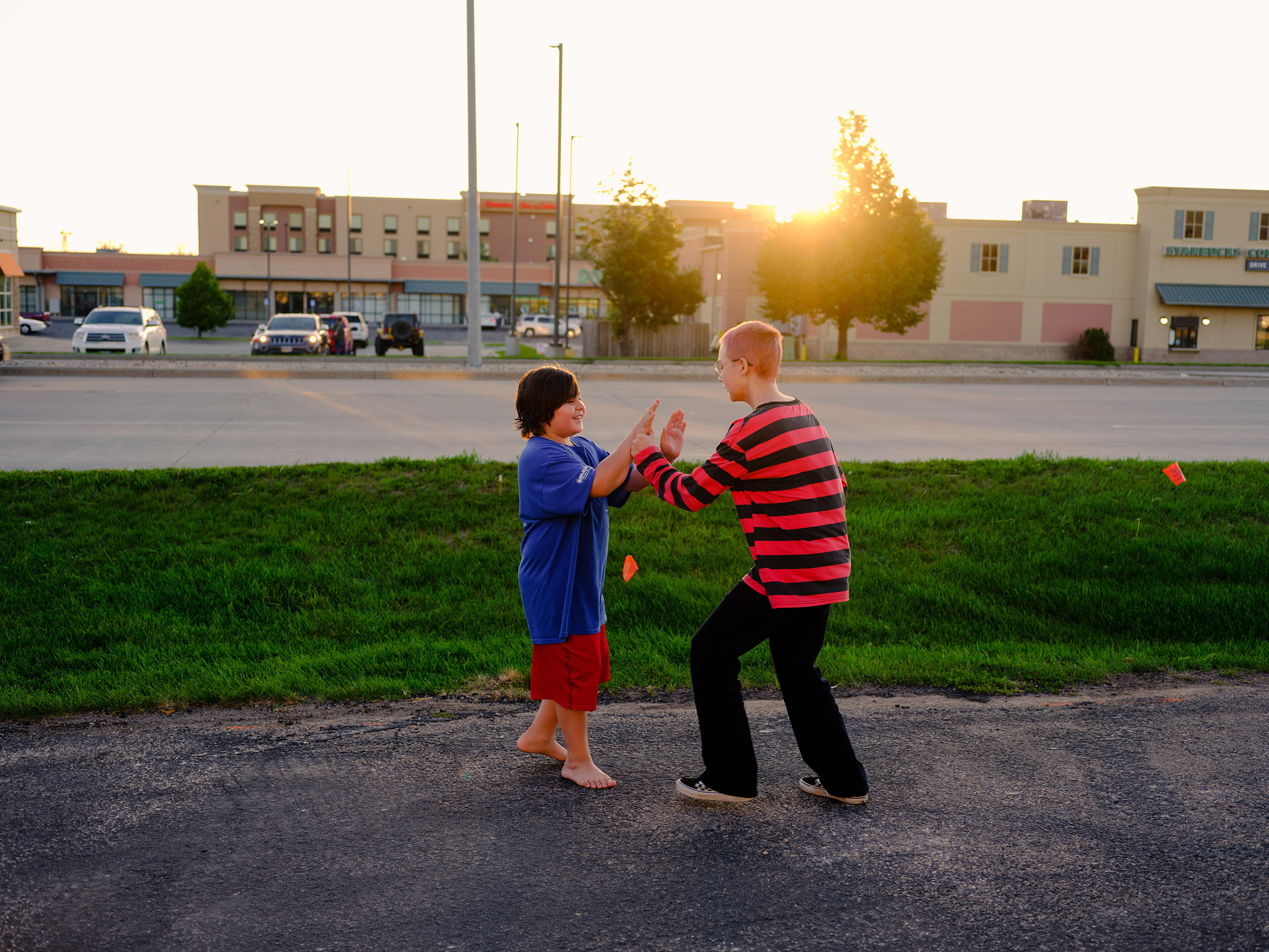 Ace and Tiny, 12, in Watertown, S.D. Ace enjoys listening to music, learning to play the drums, and practicing how to tattoo.
