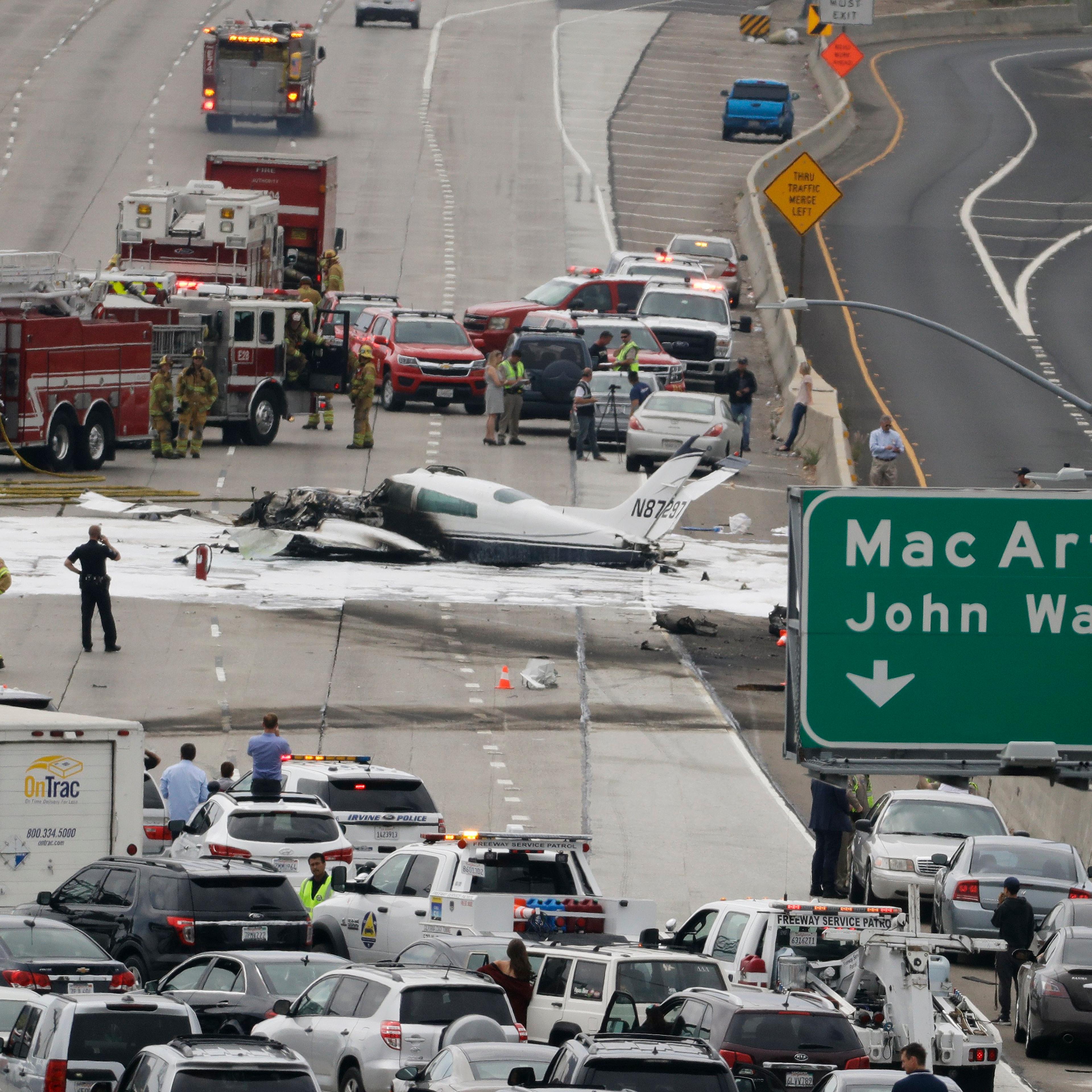 APTOPIX Freeway Plane Crash