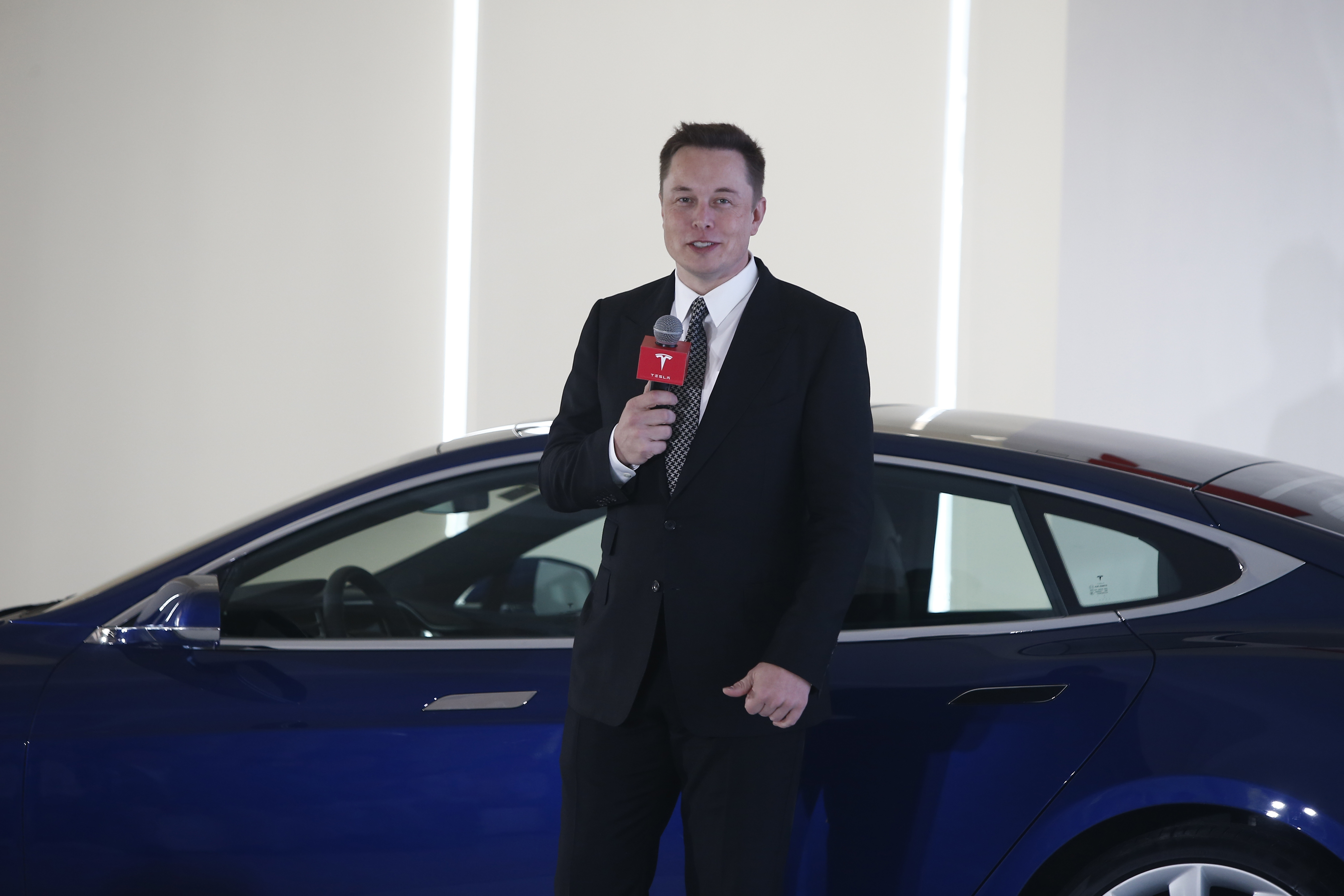 Elon Musk, Chairman, CEO and Product Architect of Tesla Motors, addresses a press conference in Beijing.