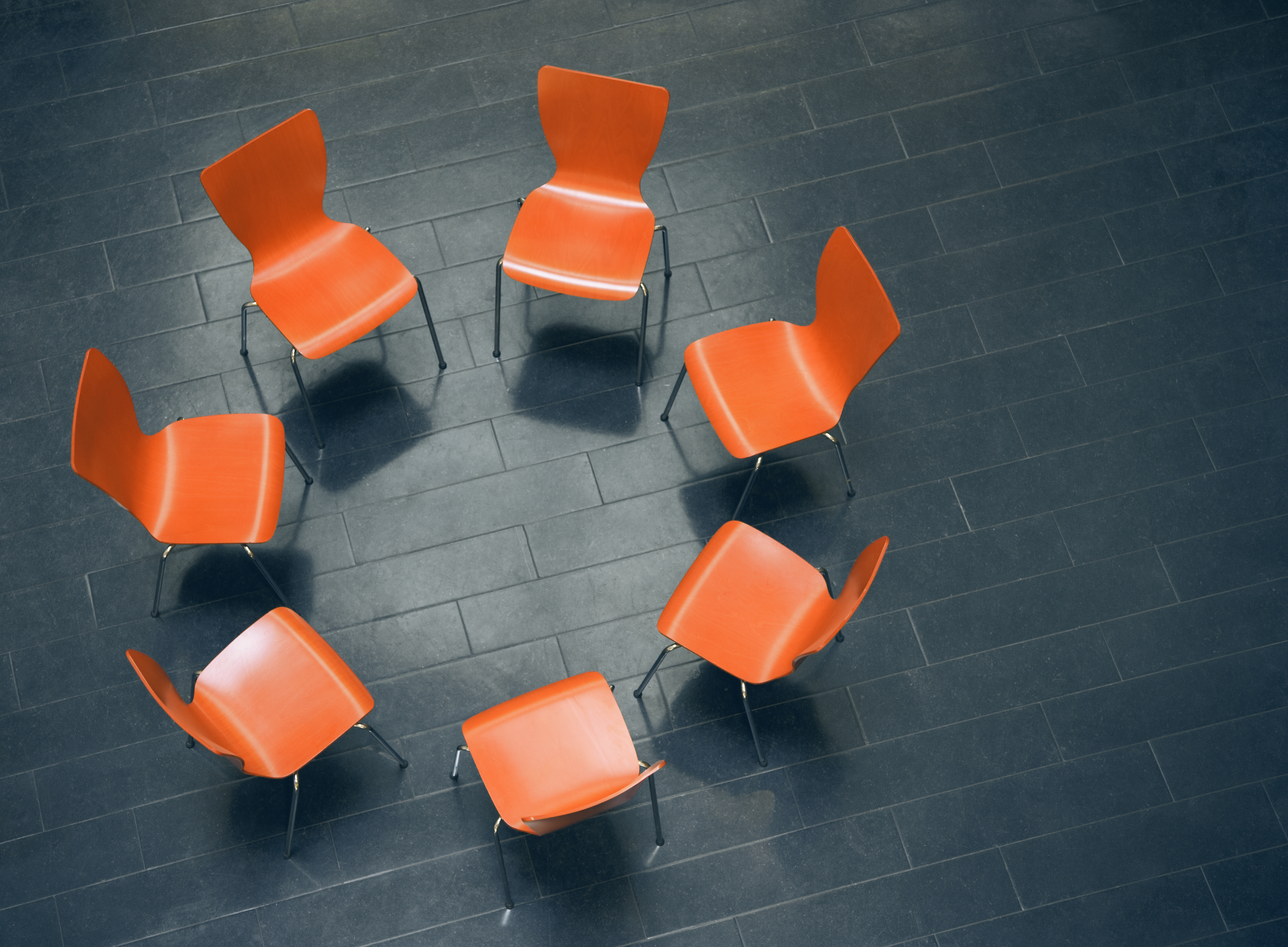 Circle of empty chairs