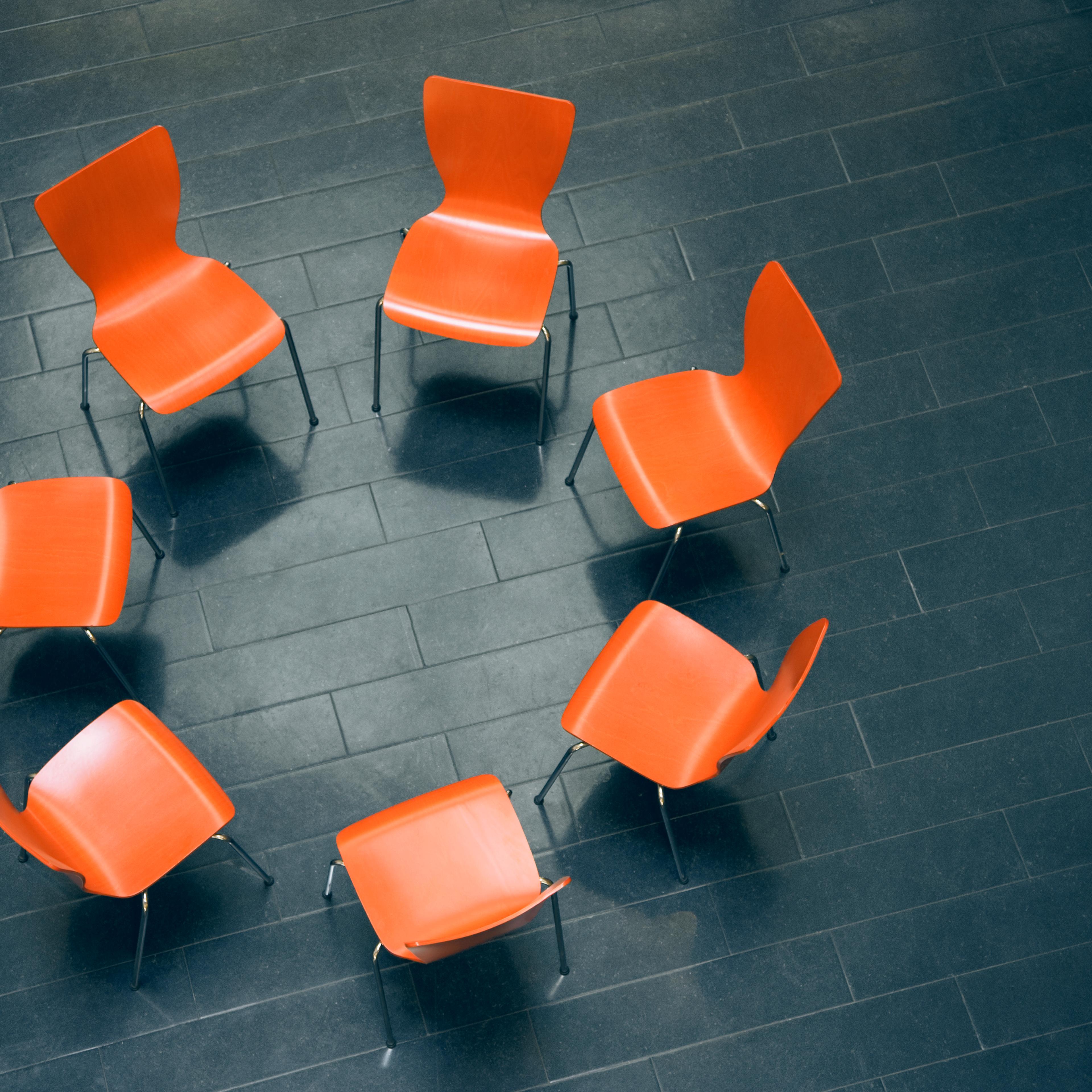 Circle of empty chairs