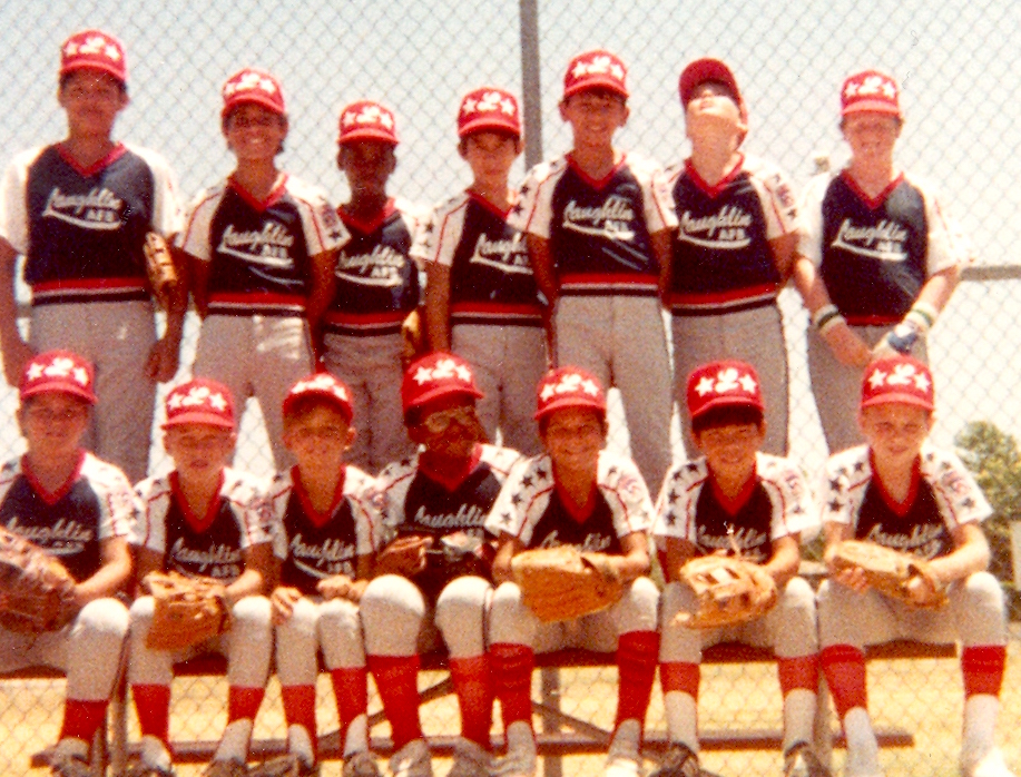 Young Troy, top row, second from right, checks out an Air Force plane flying overhead.